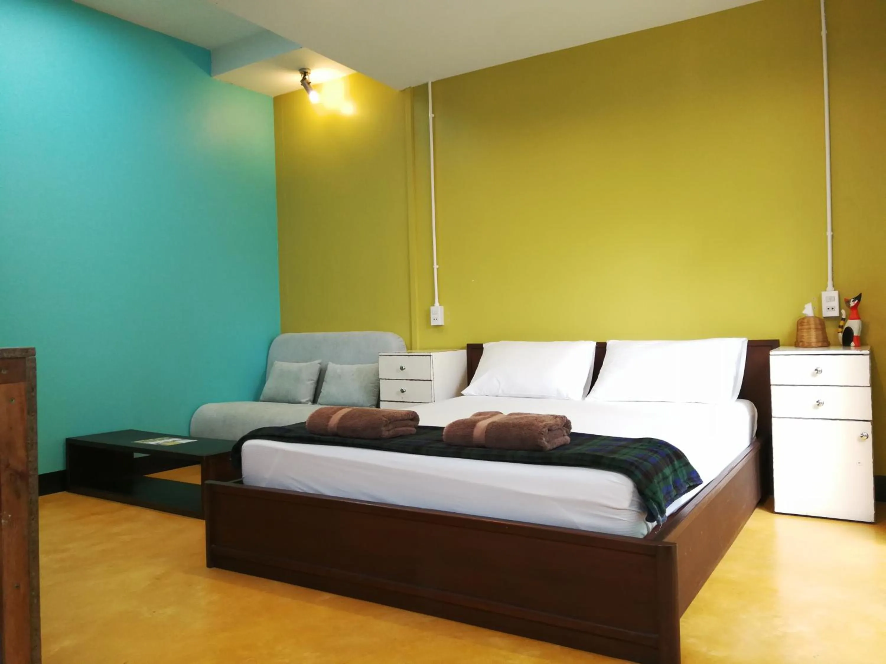 Bedroom, Bed in 60 Blue House