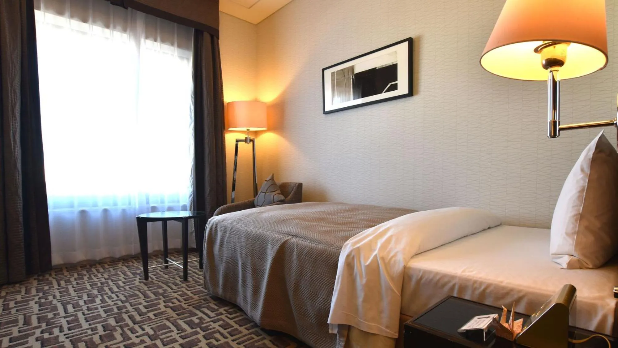 Bed in Okura Chiba Hotel