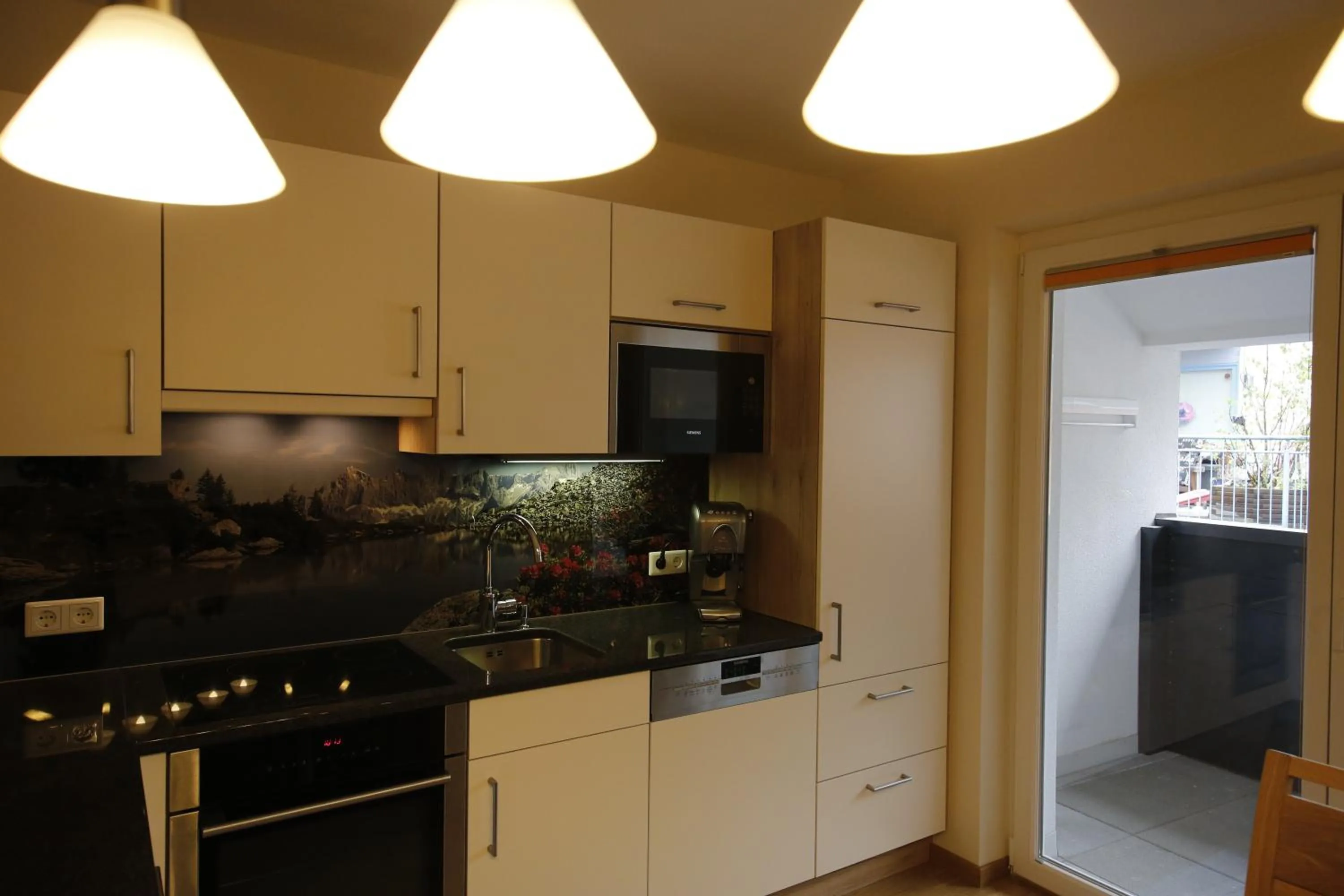 Kitchen or kitchenette in Appartement Central by Schladmingurlaub