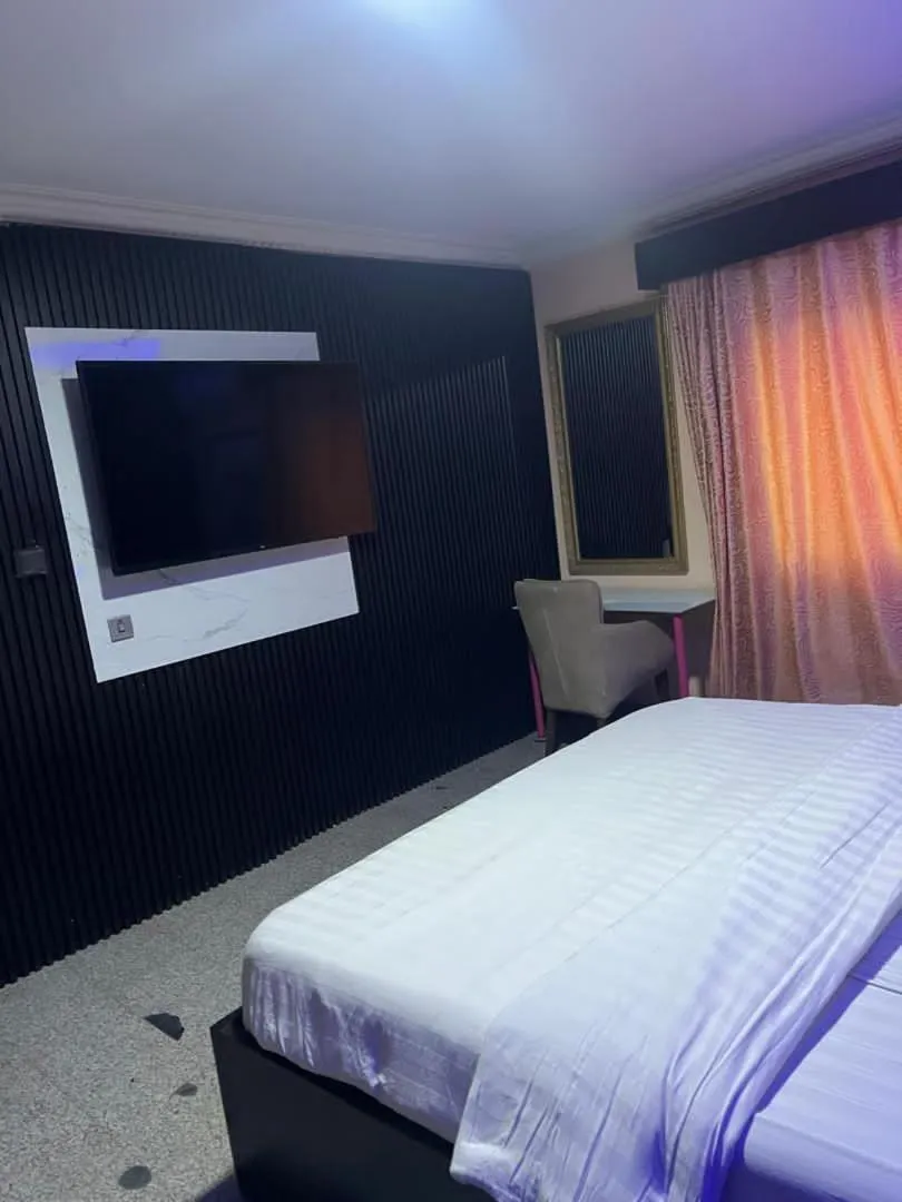 Bed in Hotel Paris Suites