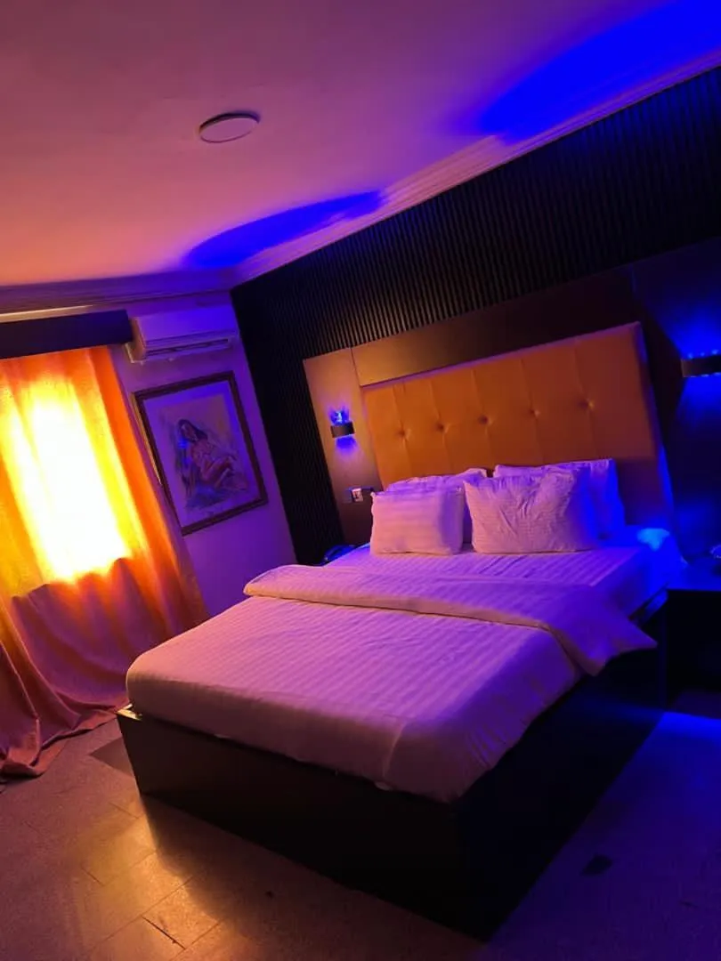 Bed in Hotel Paris Suites