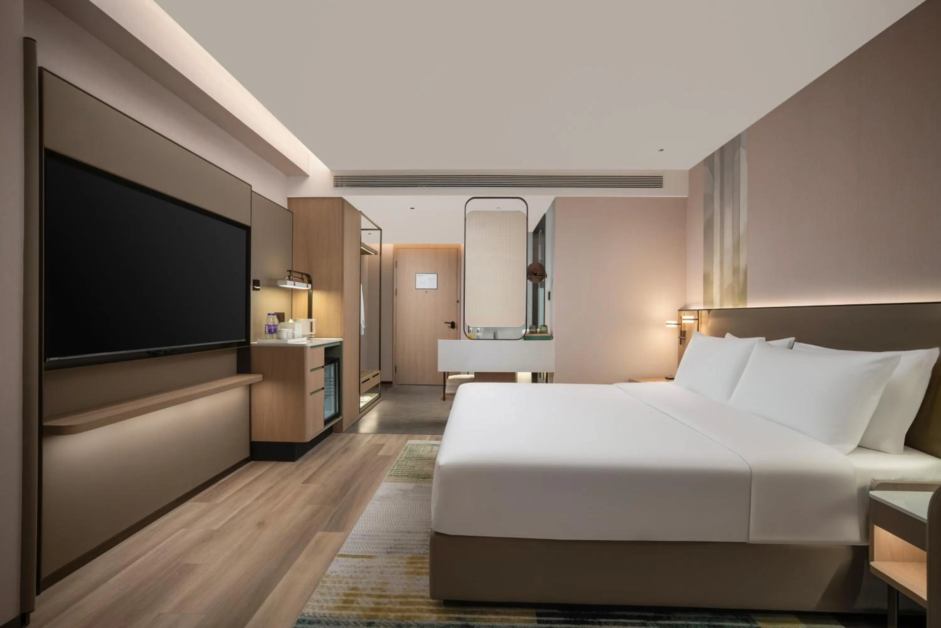 Photo of the whole room, Bed in Holiday Inn Yiwu Center by IHG