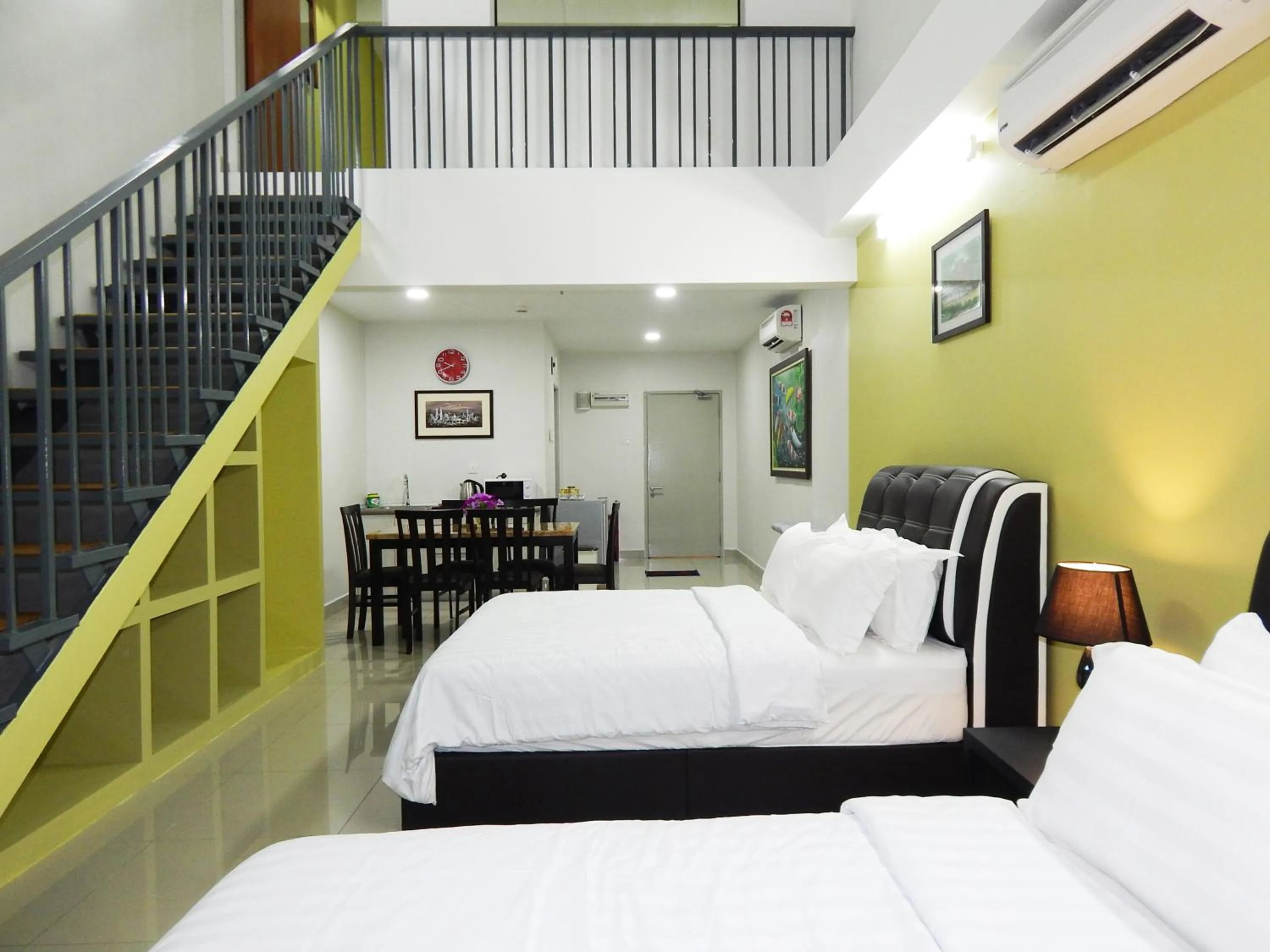 Photo of the whole room, Bed in Wadi Iman Guesthouse @ i-City