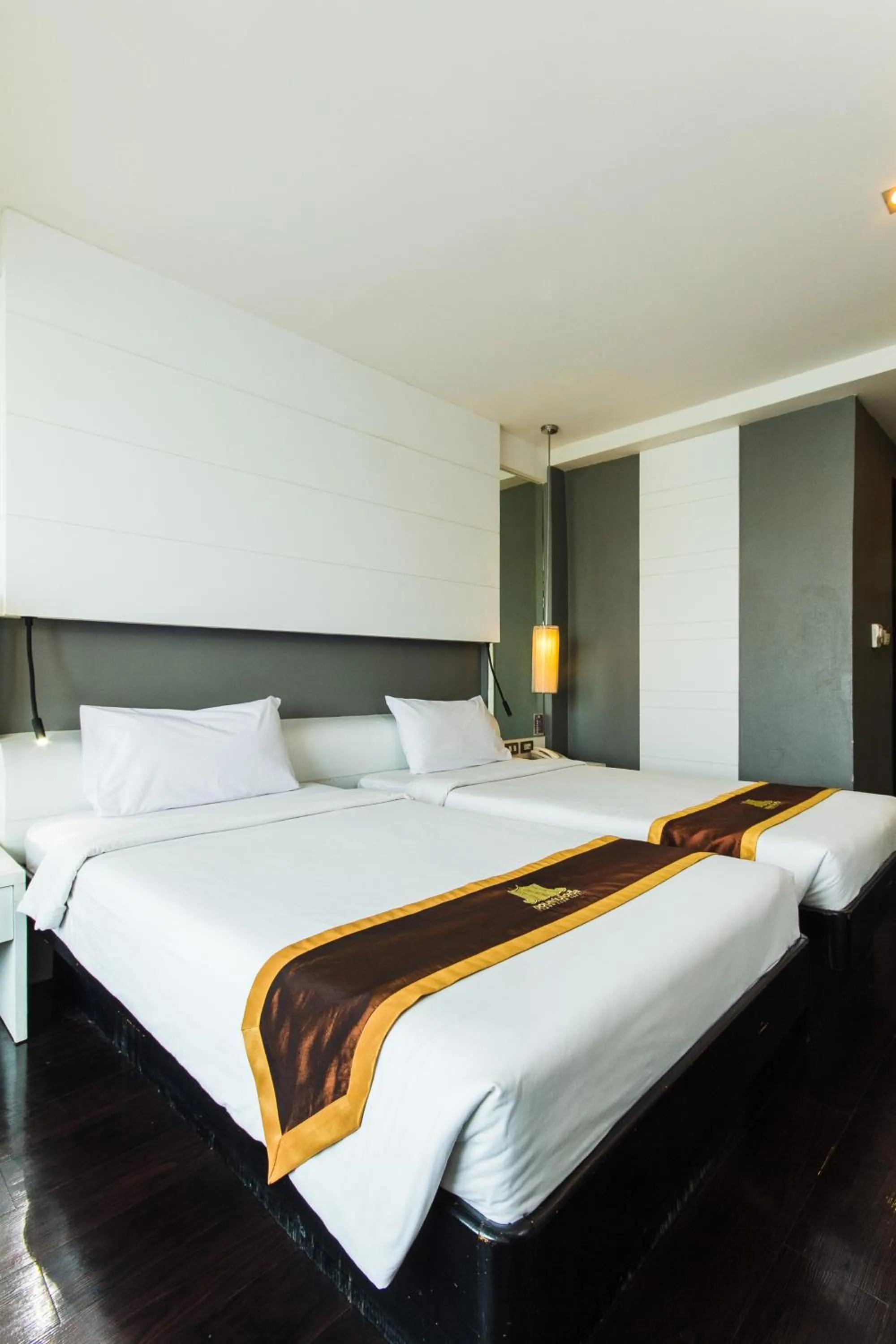 Bed in Khon Kaen Hotel