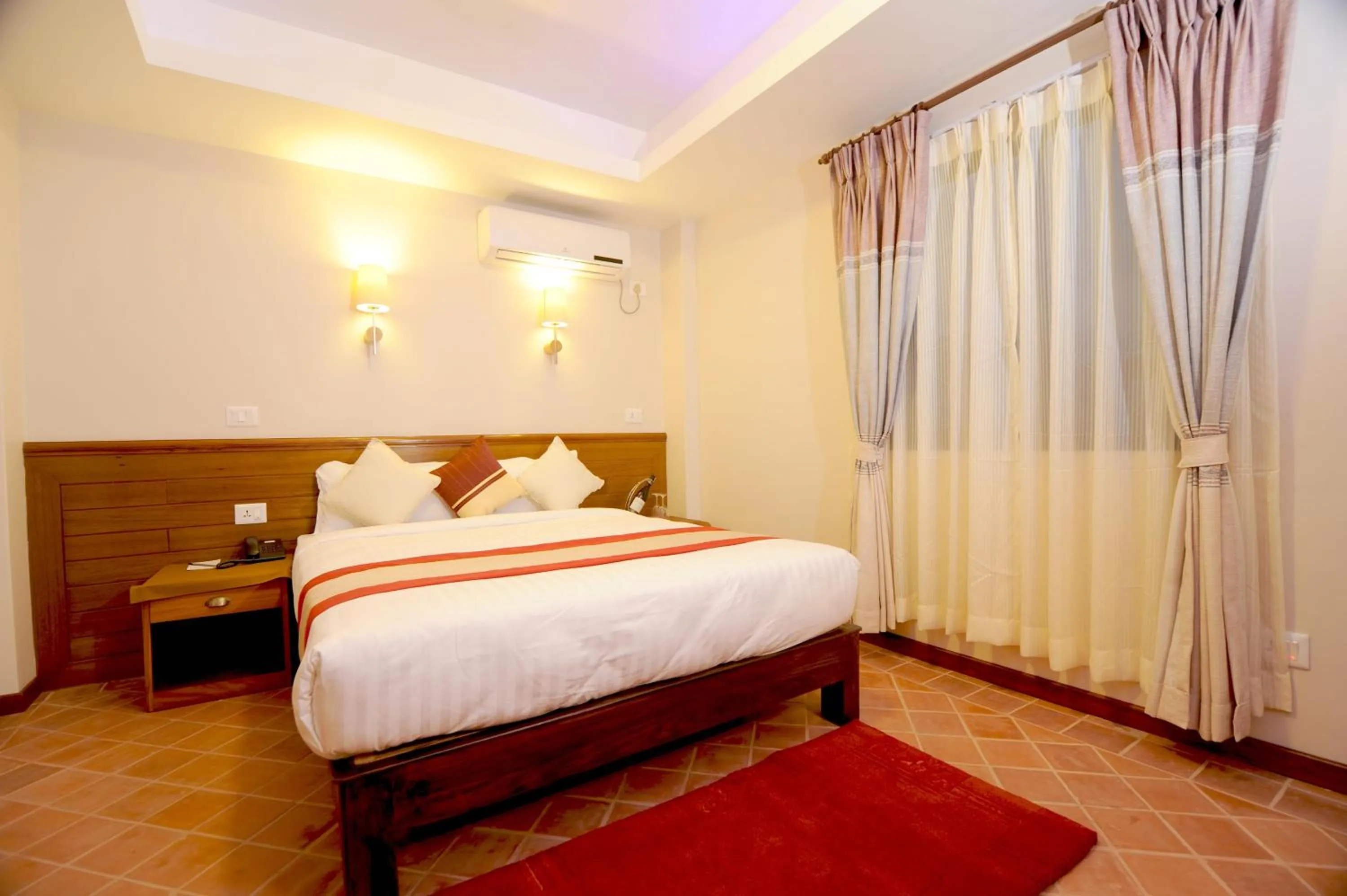 Decorative detail, Bed in Hotel Utsab Himalaya