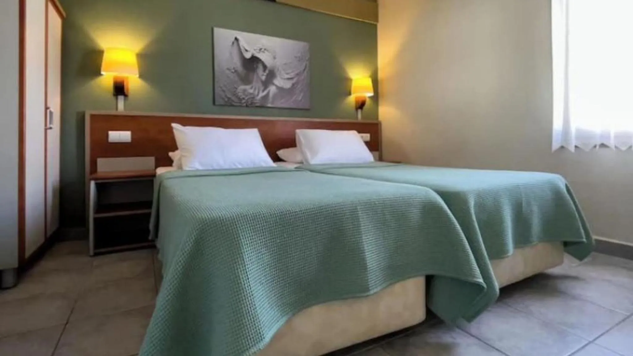 Bed in Green Mar Hotel