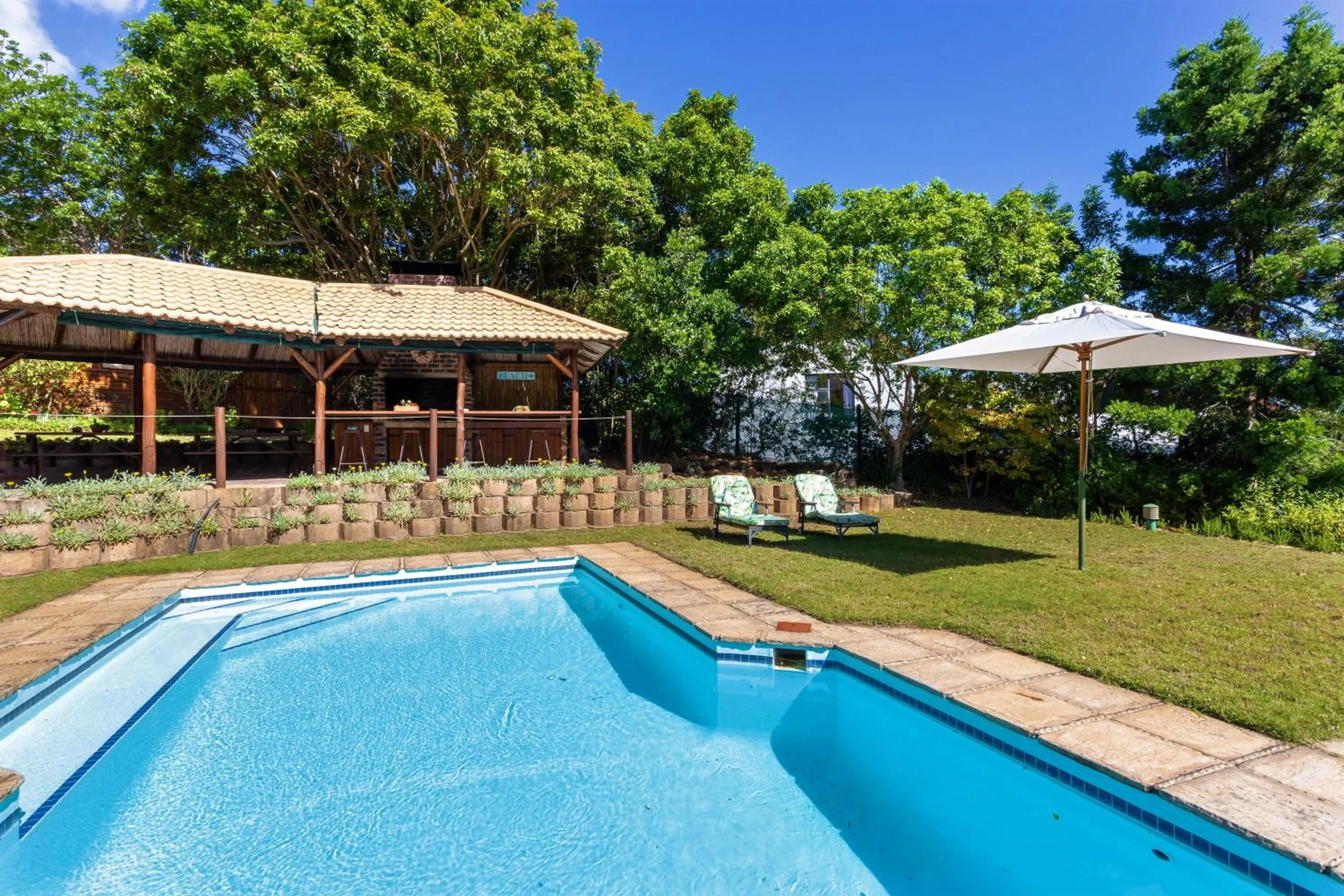 Pool view in Pumula Lodge 4 Star Guesthouse Knysna