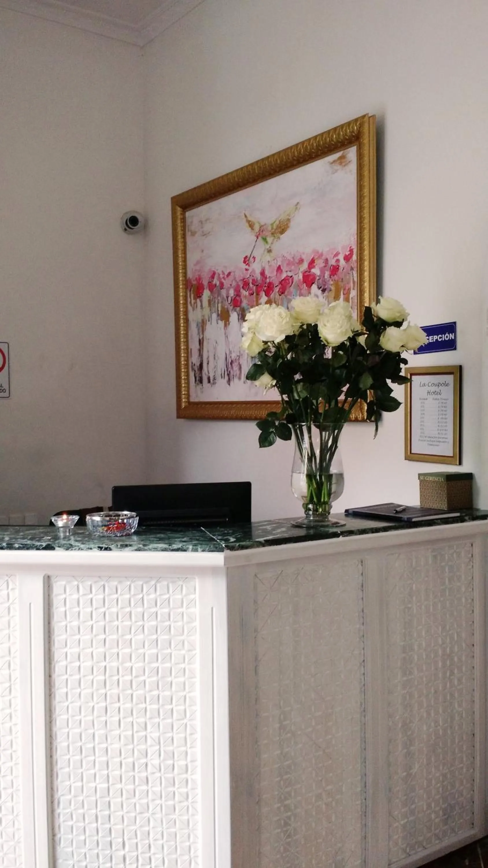 Lobby or reception in La Coupole Hotel