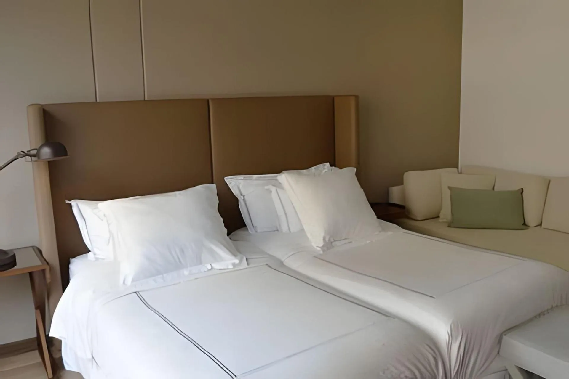 Bed in Attik Luxury Apts