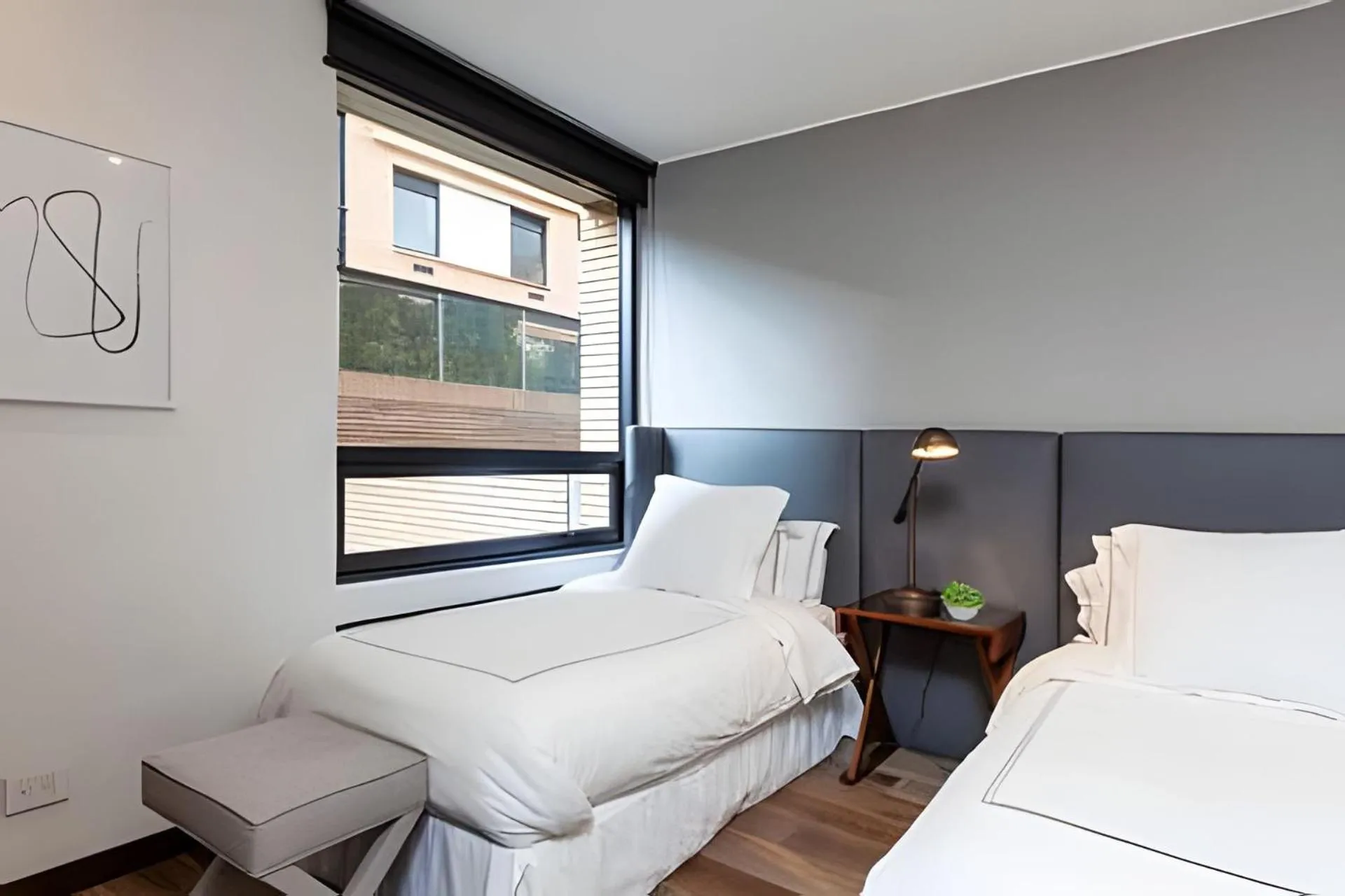 Bed in Attik Luxury Apts