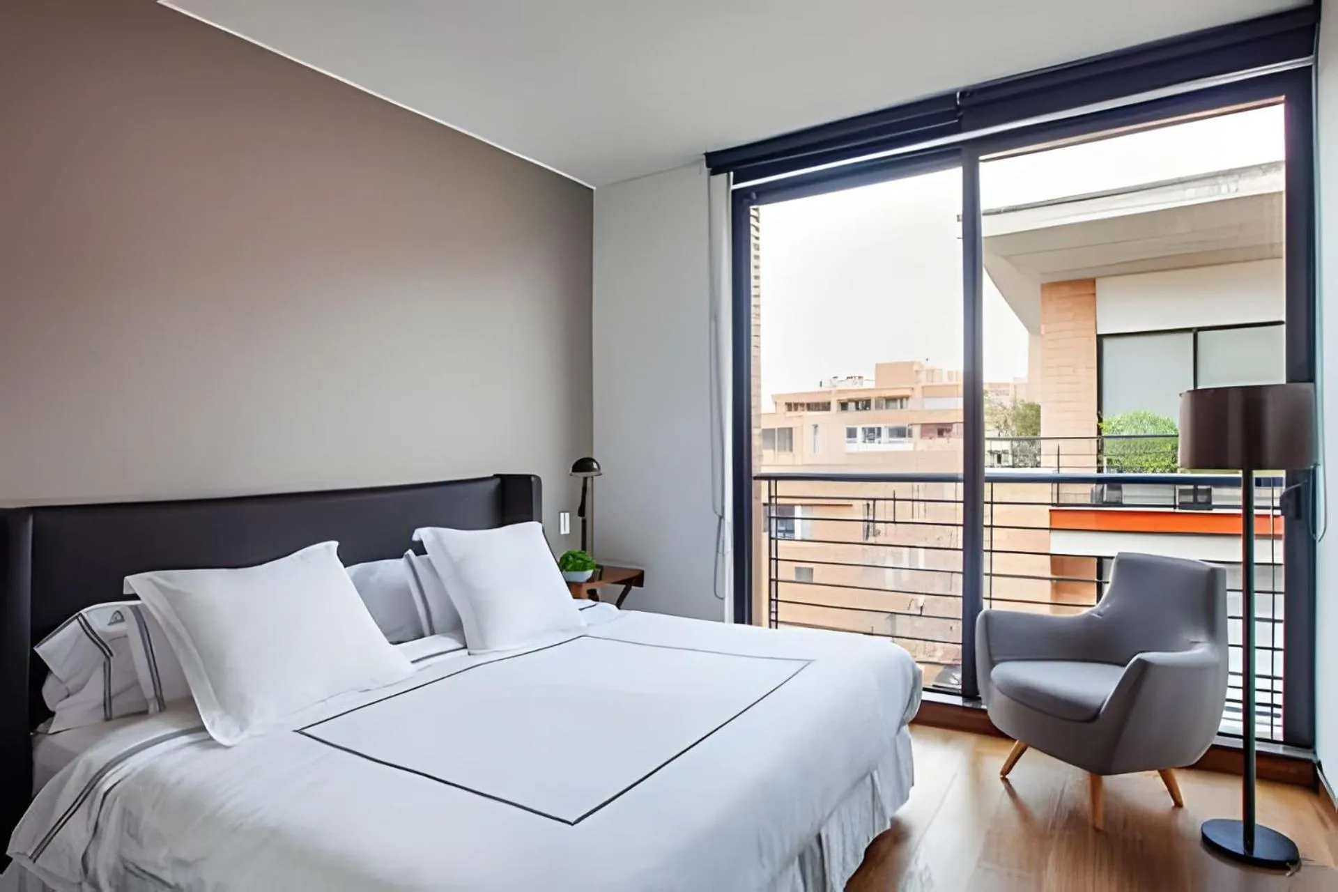 Bed in Attik Luxury Apts