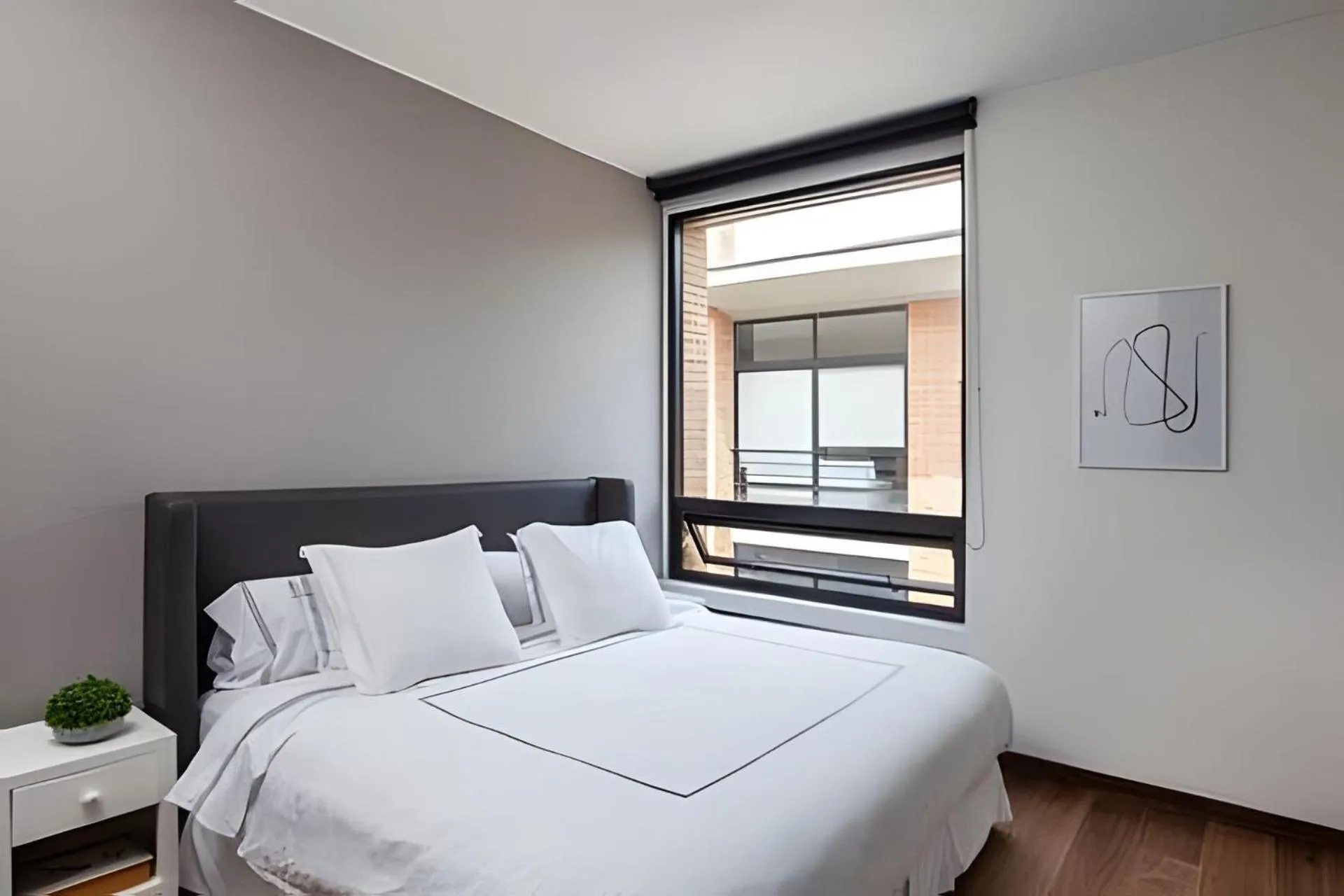 Bed in Attik Luxury Apts