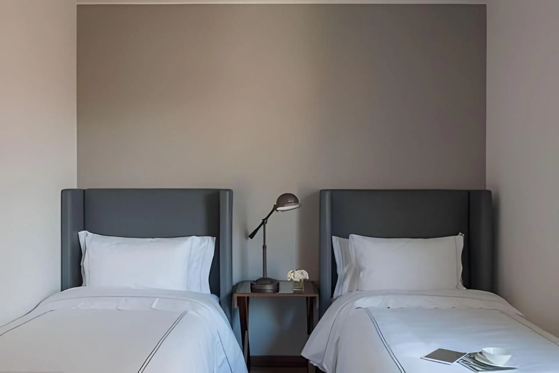 Bed in Attik Luxury Apts