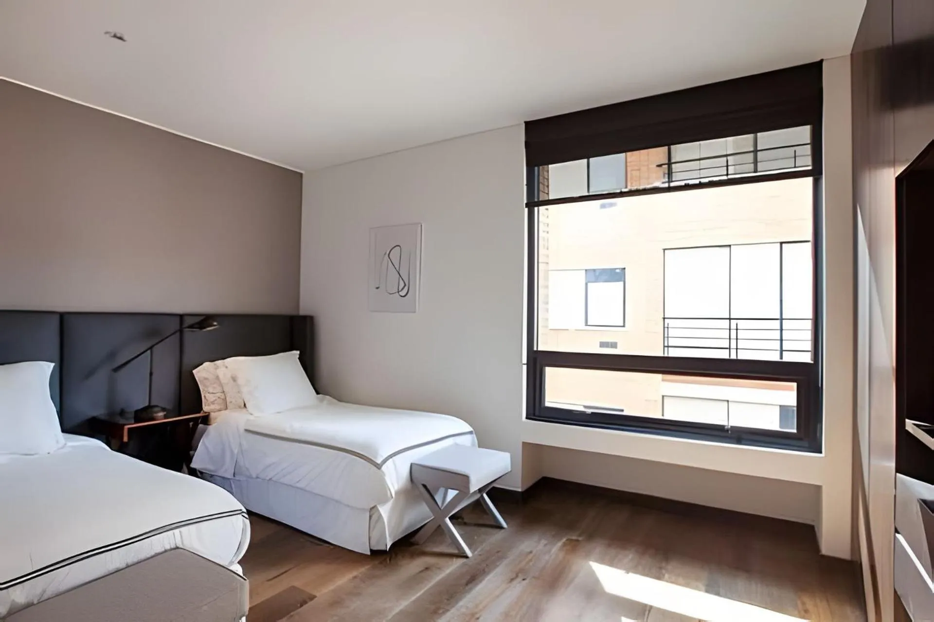 Bed in Attik Luxury Apts