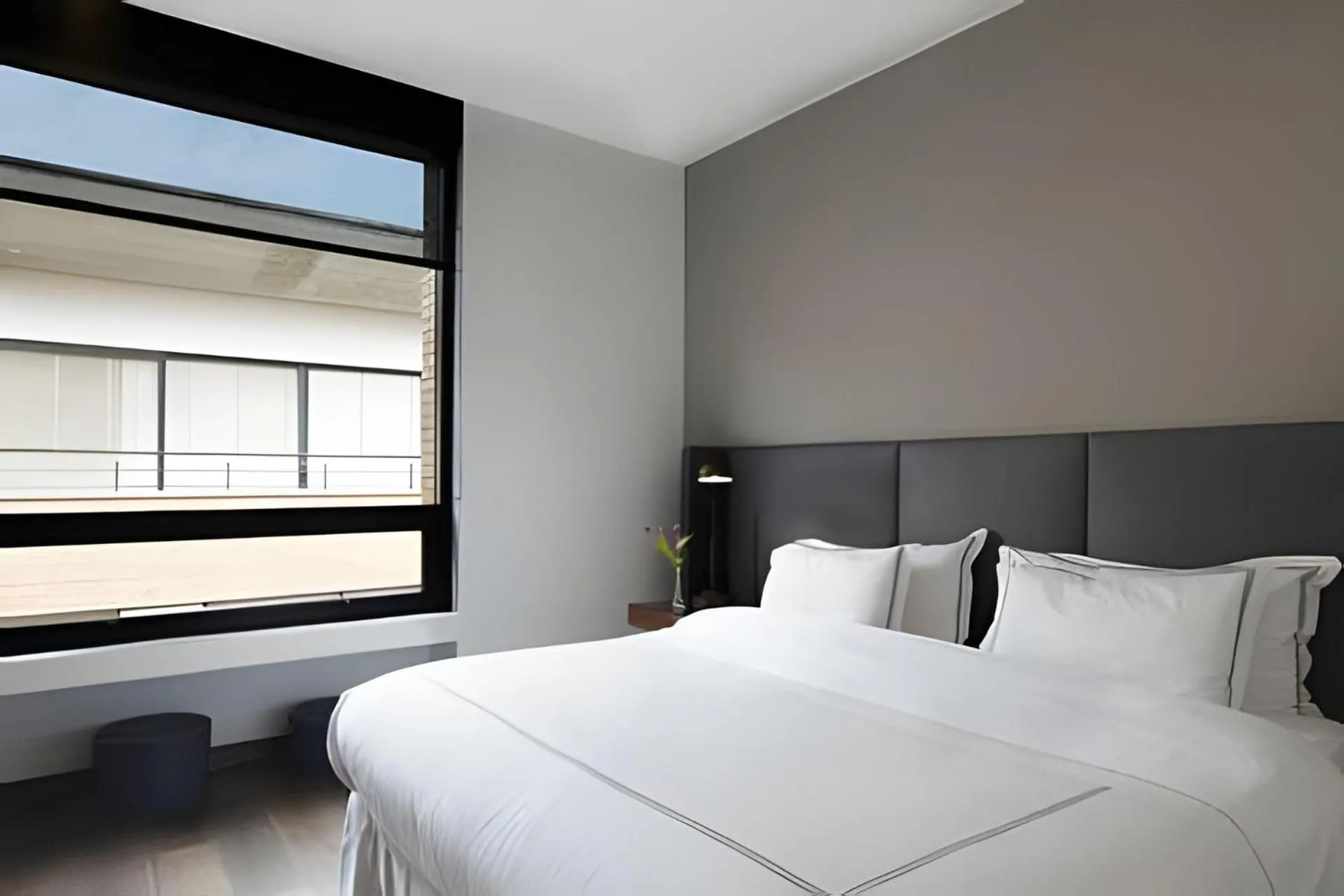 Bed in Attik Luxury Apts