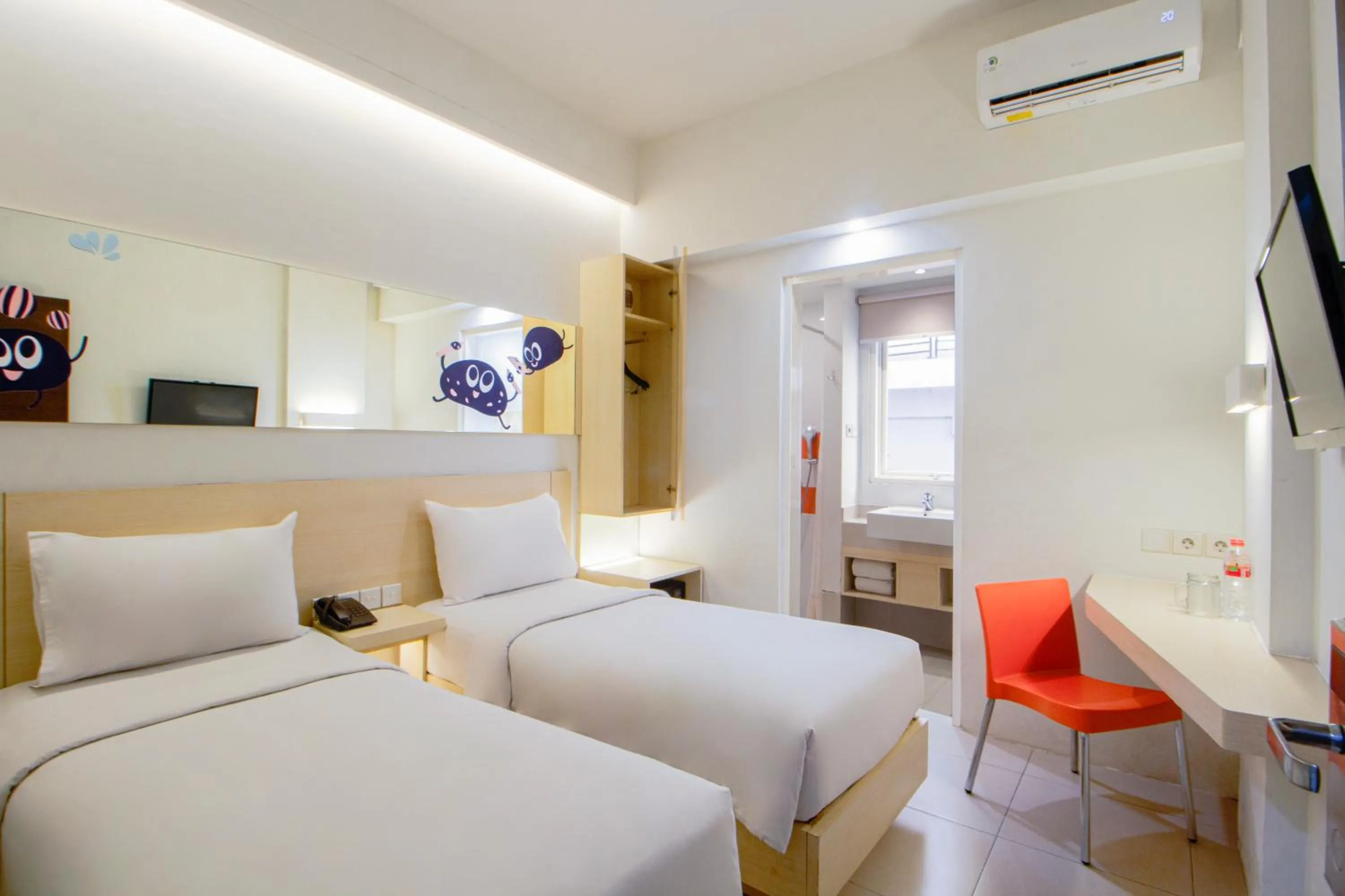 Bed in Cleo Hotel Tunjungan