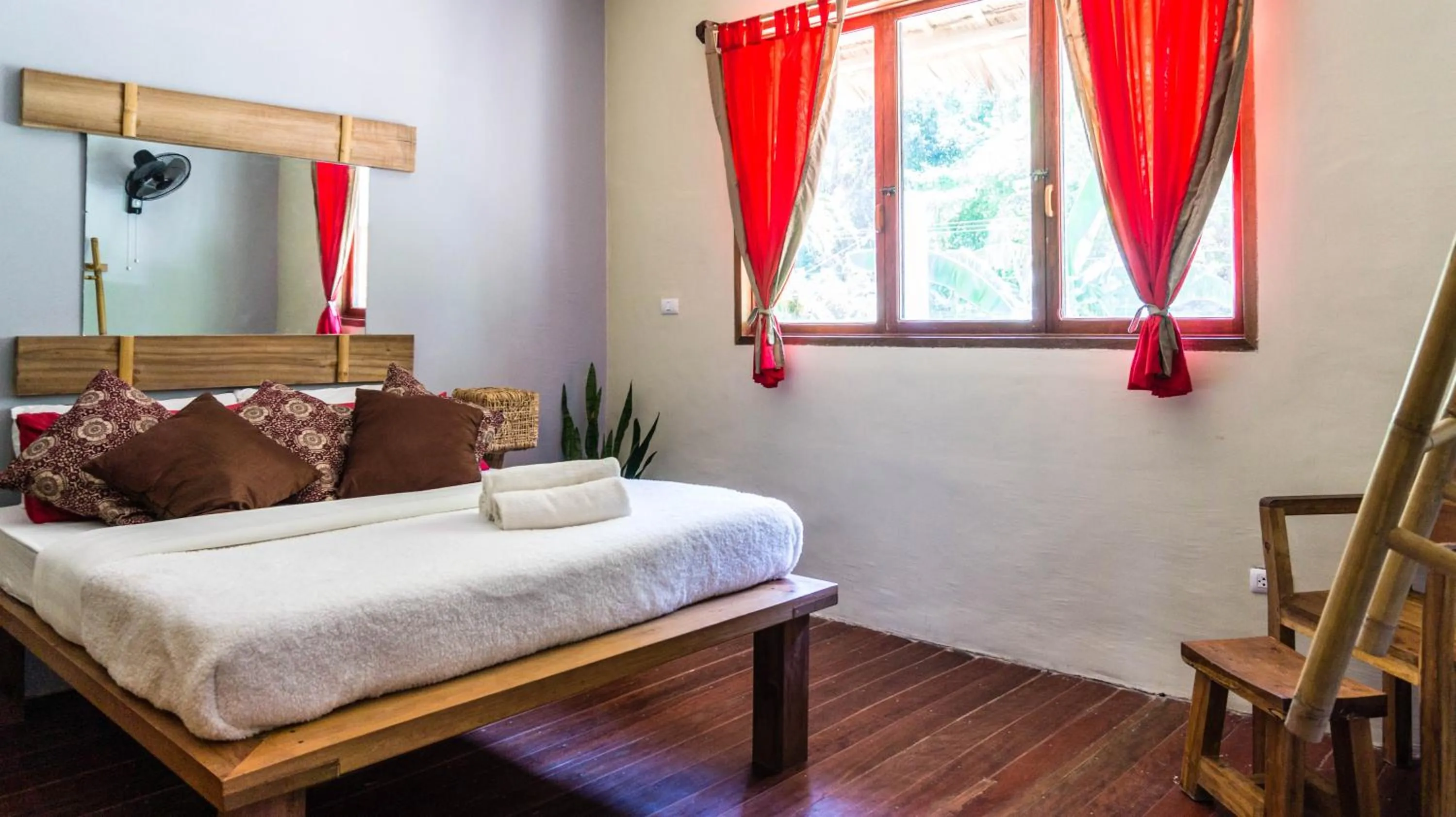 Bed in Happiness Boutique Resort El Nido