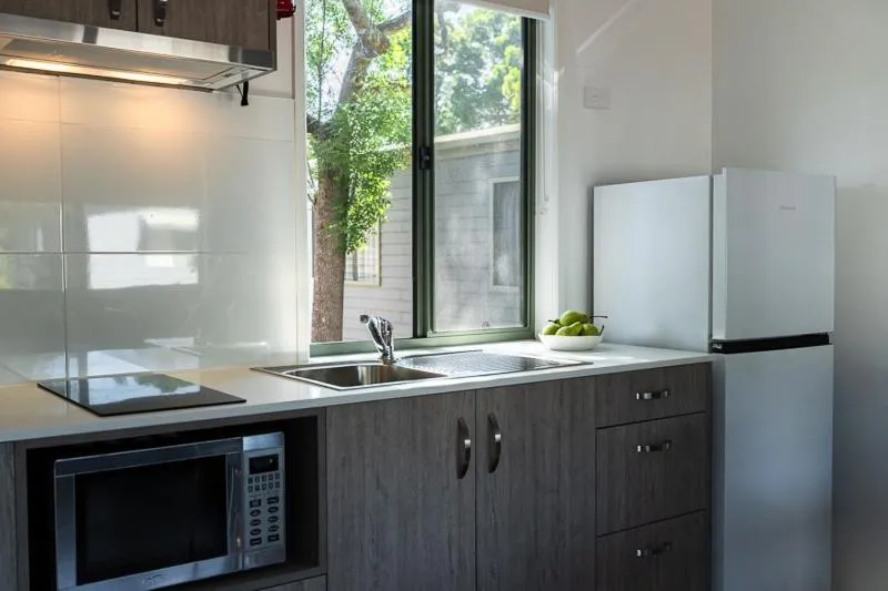 Kitchen or kitchenette in Adelaide Caravan Park - Aspen Holiday Parks