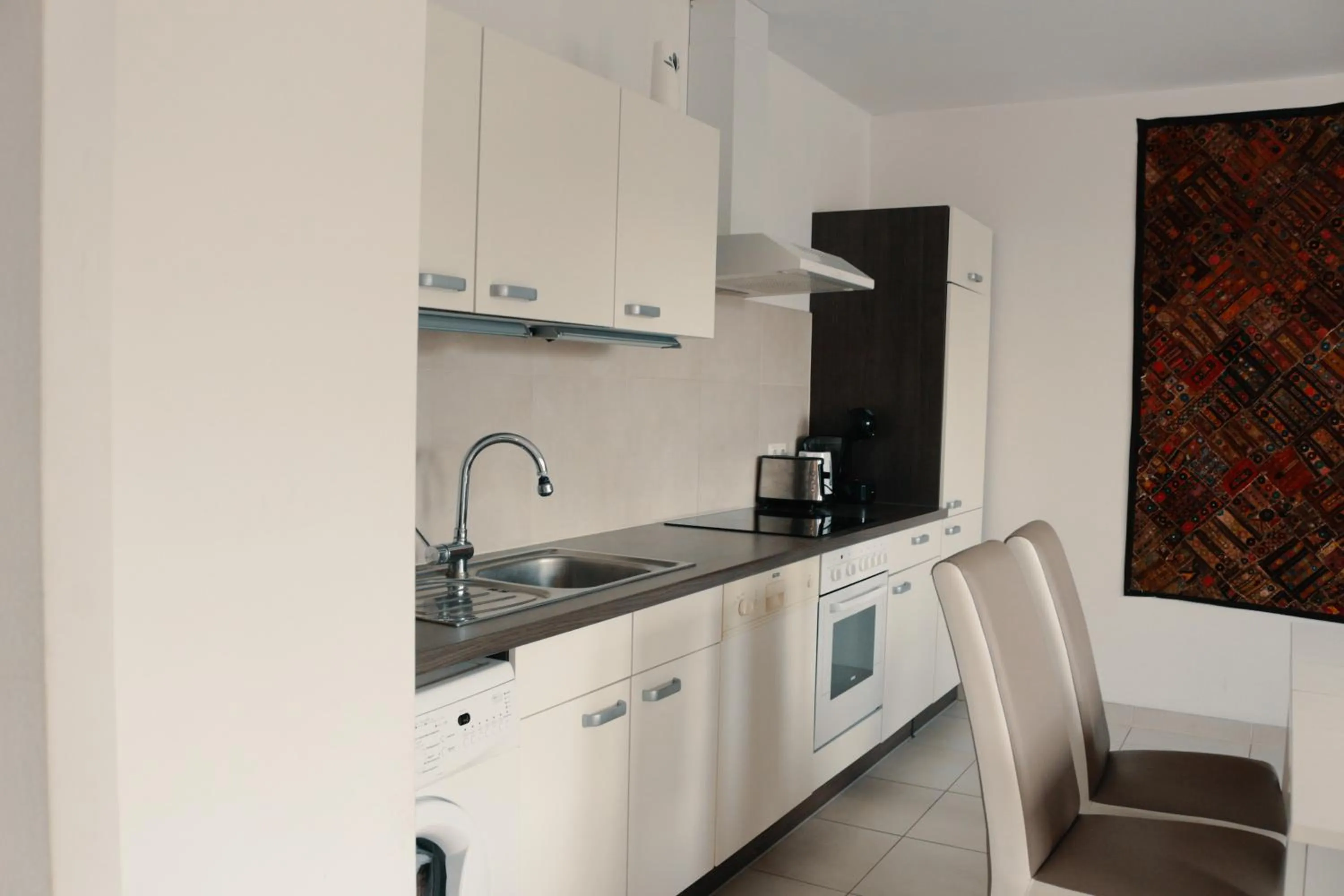 Kitchen or kitchenette in Vienna Airport Residences