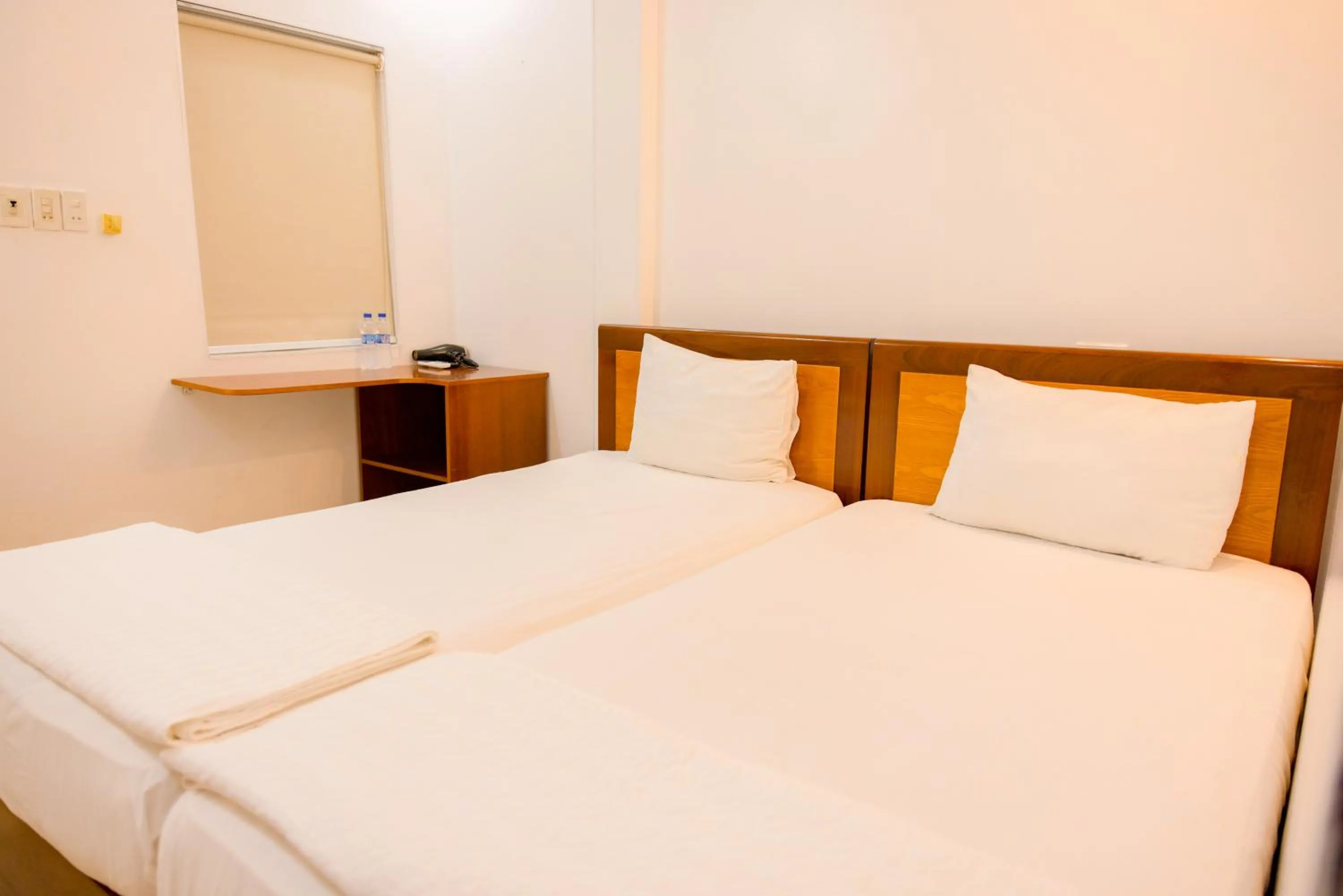 Bed in Ngoc Anh Legend Hotel