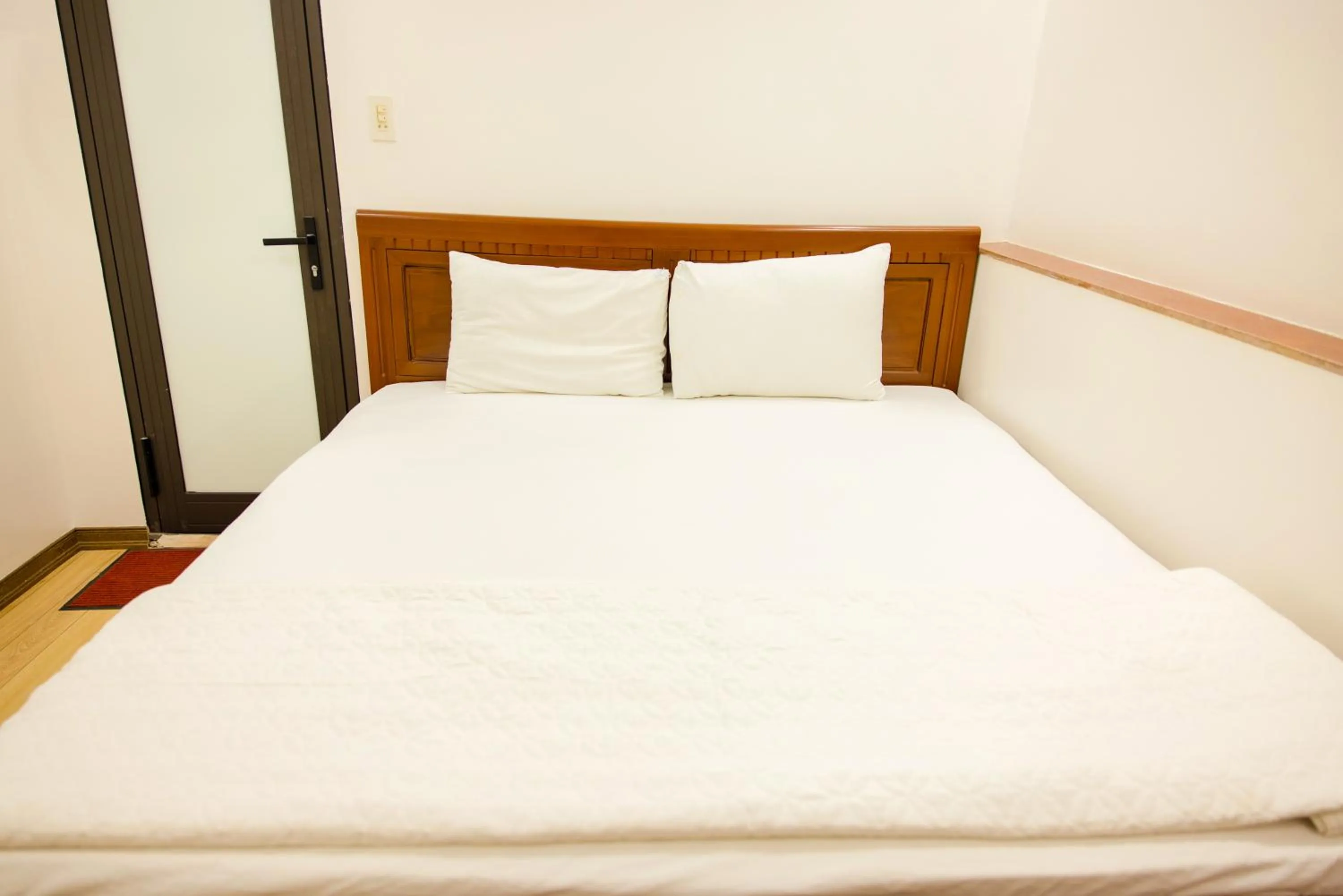 Bed in Ngoc Anh Legend Hotel