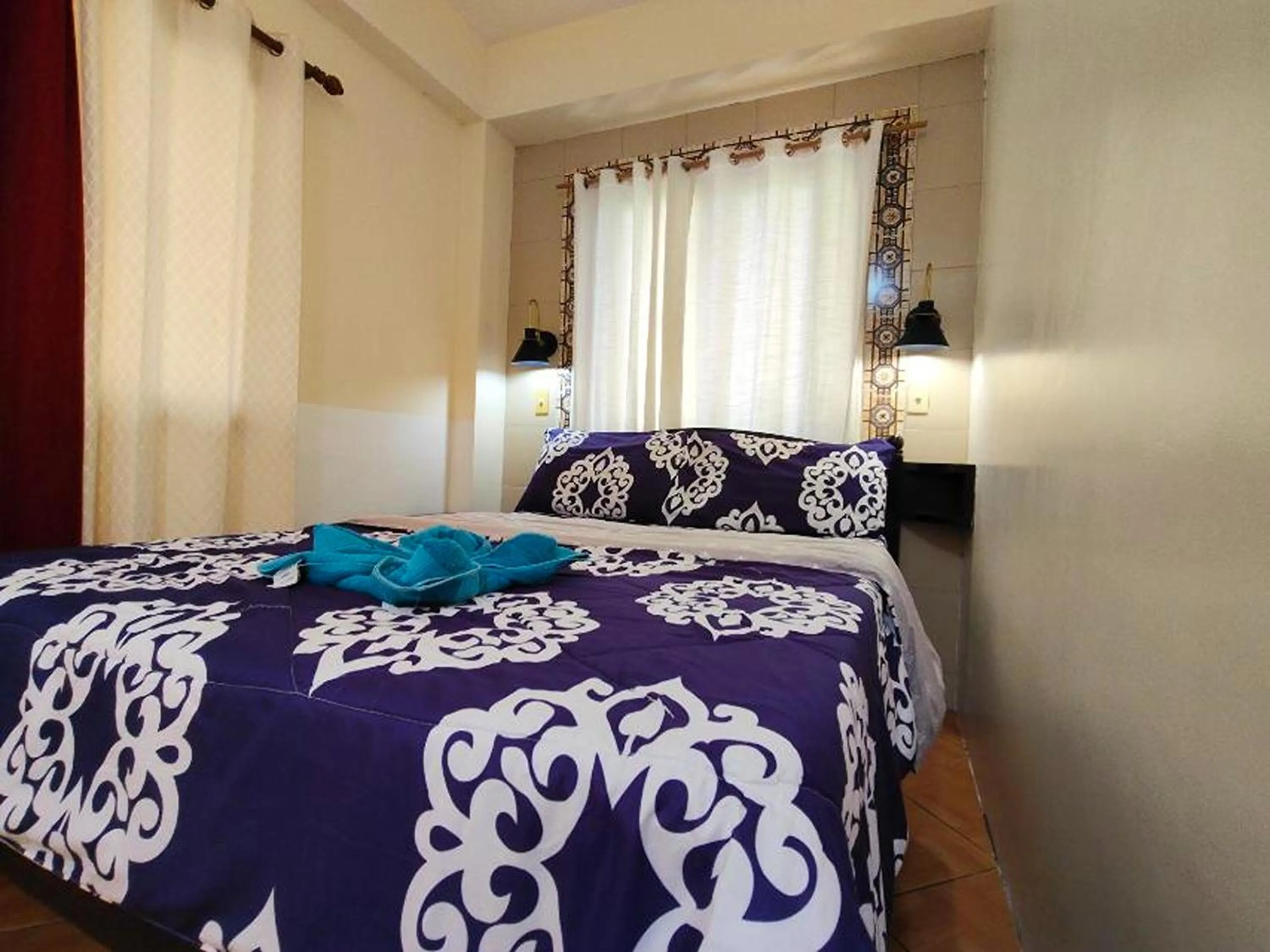 Bed in Punta Riviera Resort Bolinao