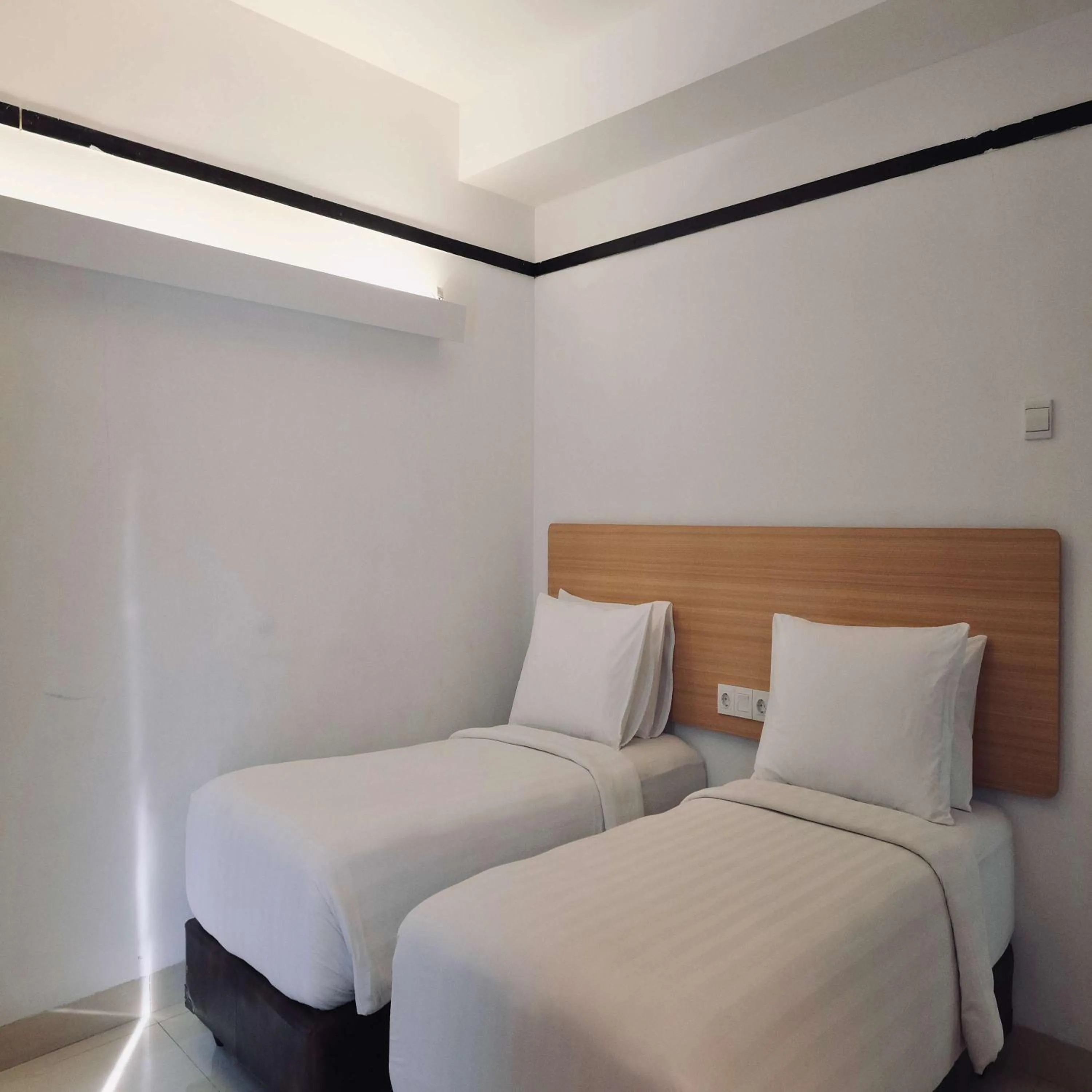 Bed in Clove Hotel Bandung
