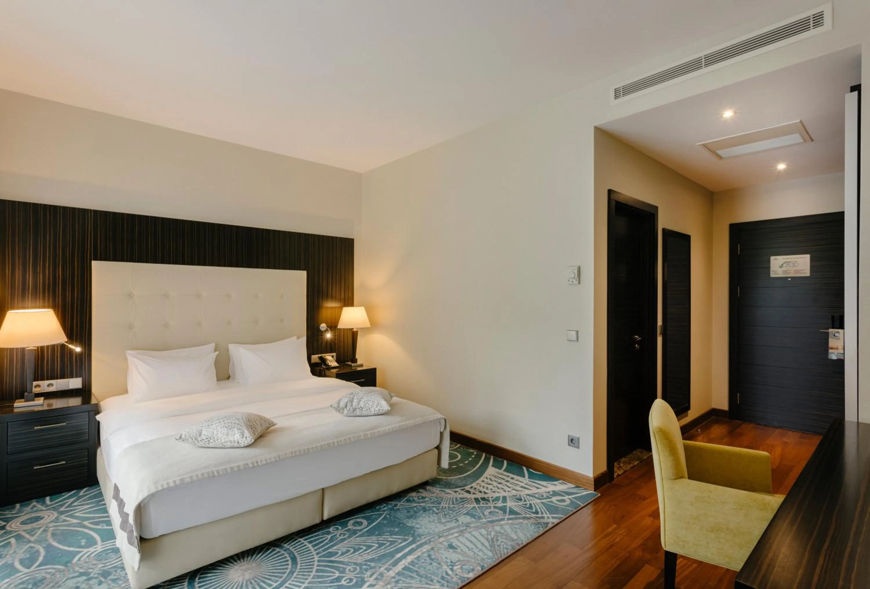 Photo of the whole room, Bed in Crowne Plaza - Borjomi by IHG