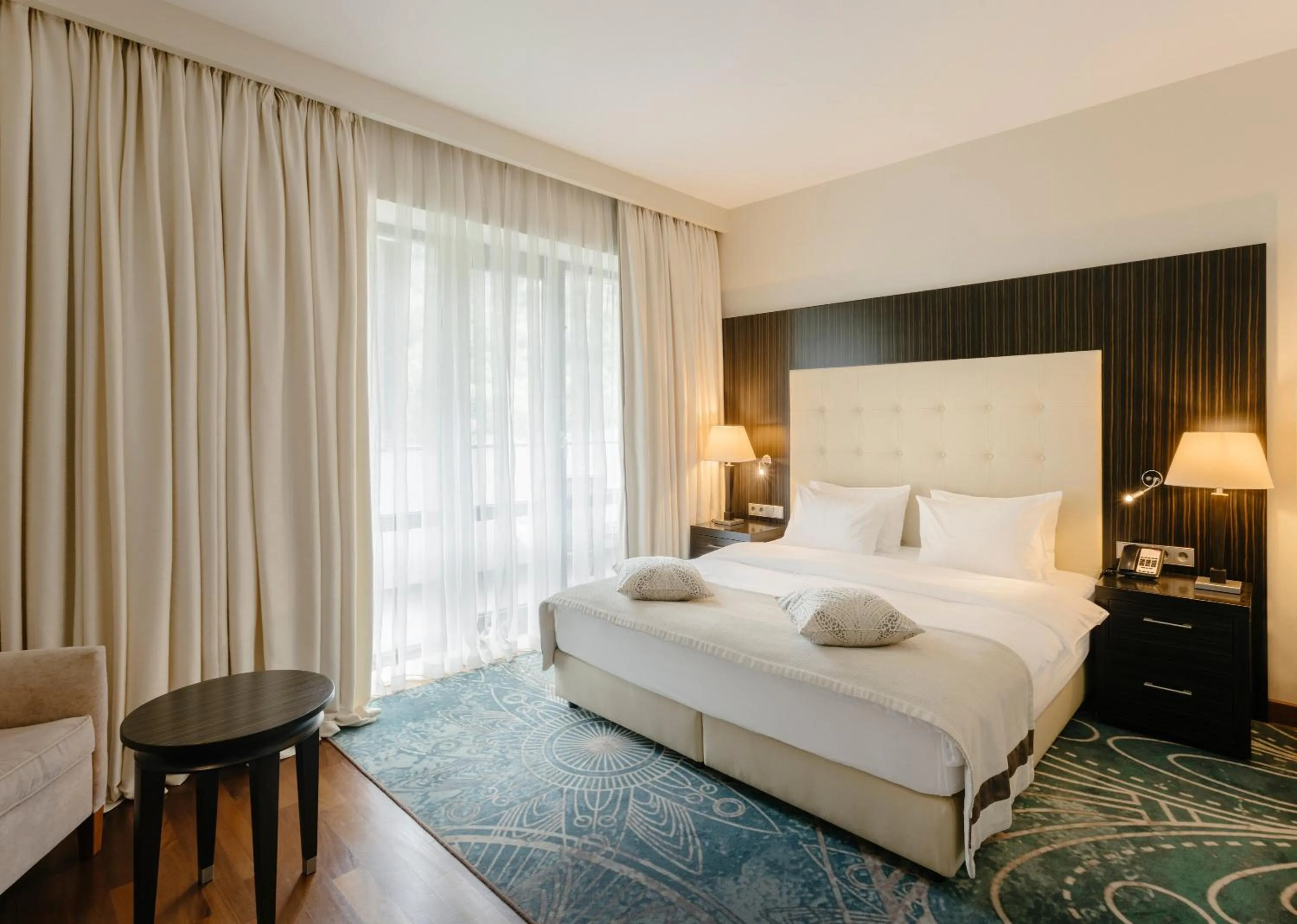 Photo of the whole room, Bed in Crowne Plaza - Borjomi by IHG