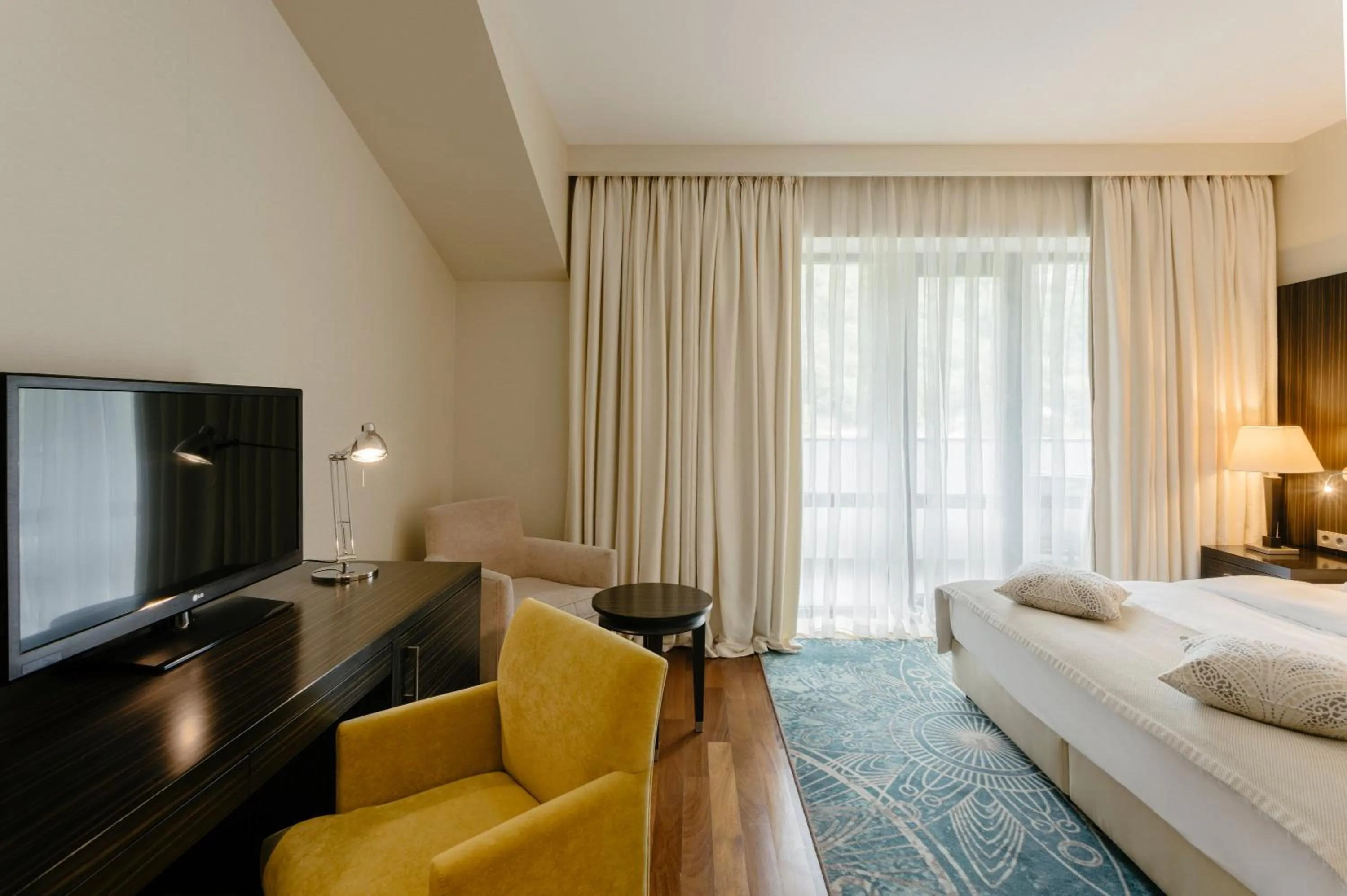 Photo of the whole room, Bed in Crowne Plaza - Borjomi by IHG