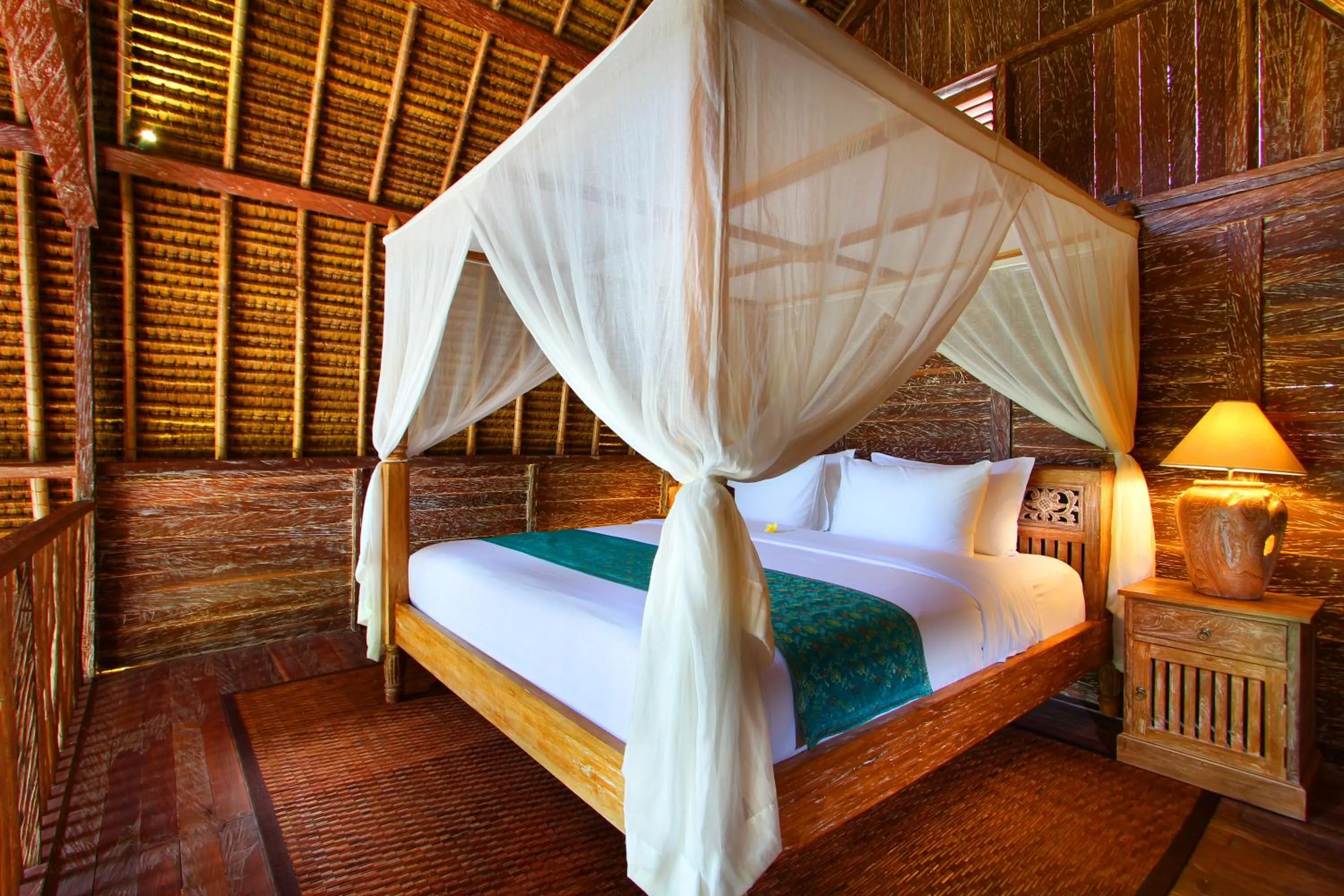 Bed in De Klumpu Bali Eco Tradi Stay