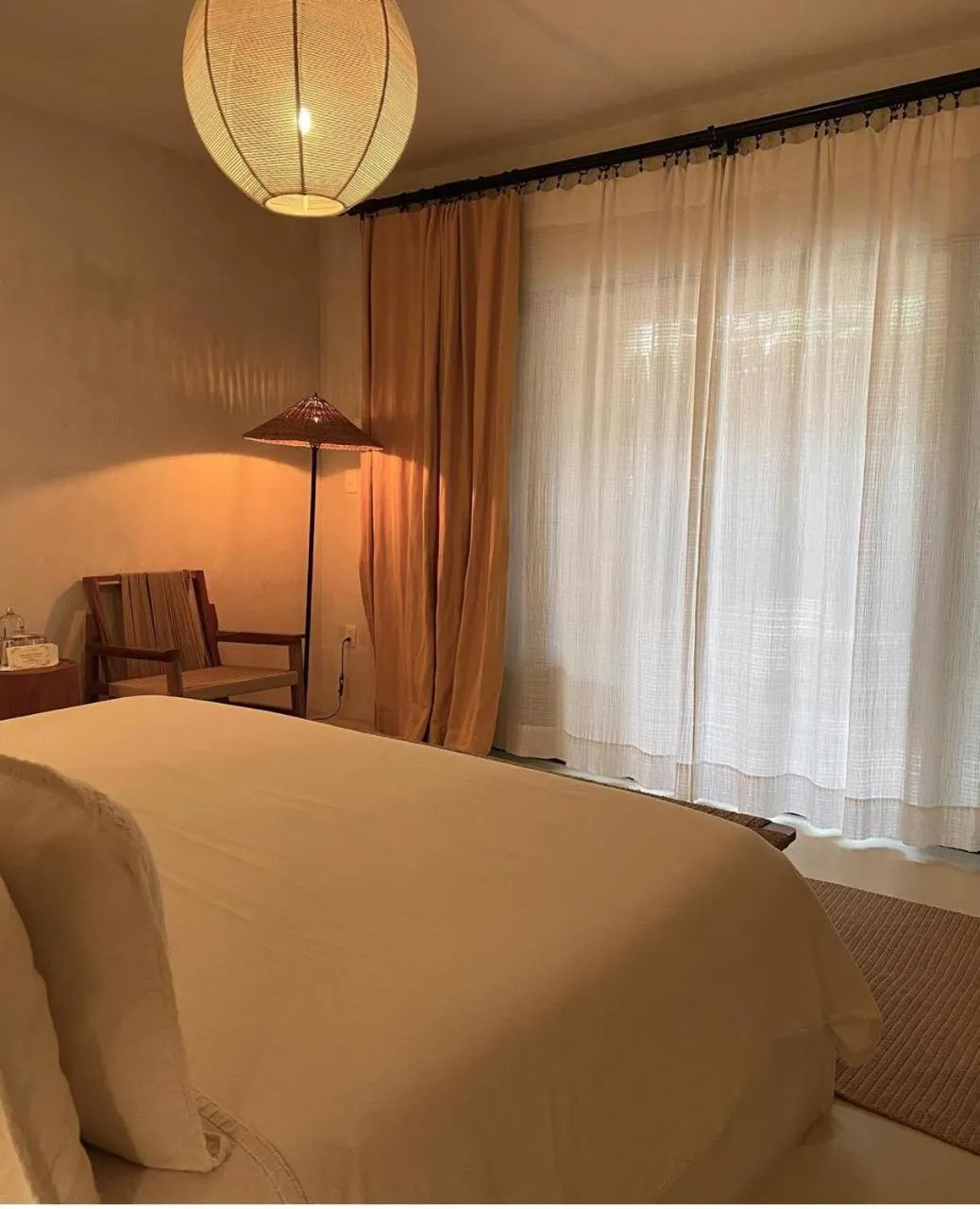 Bed in Dune Boutique Hotel located at the party zone