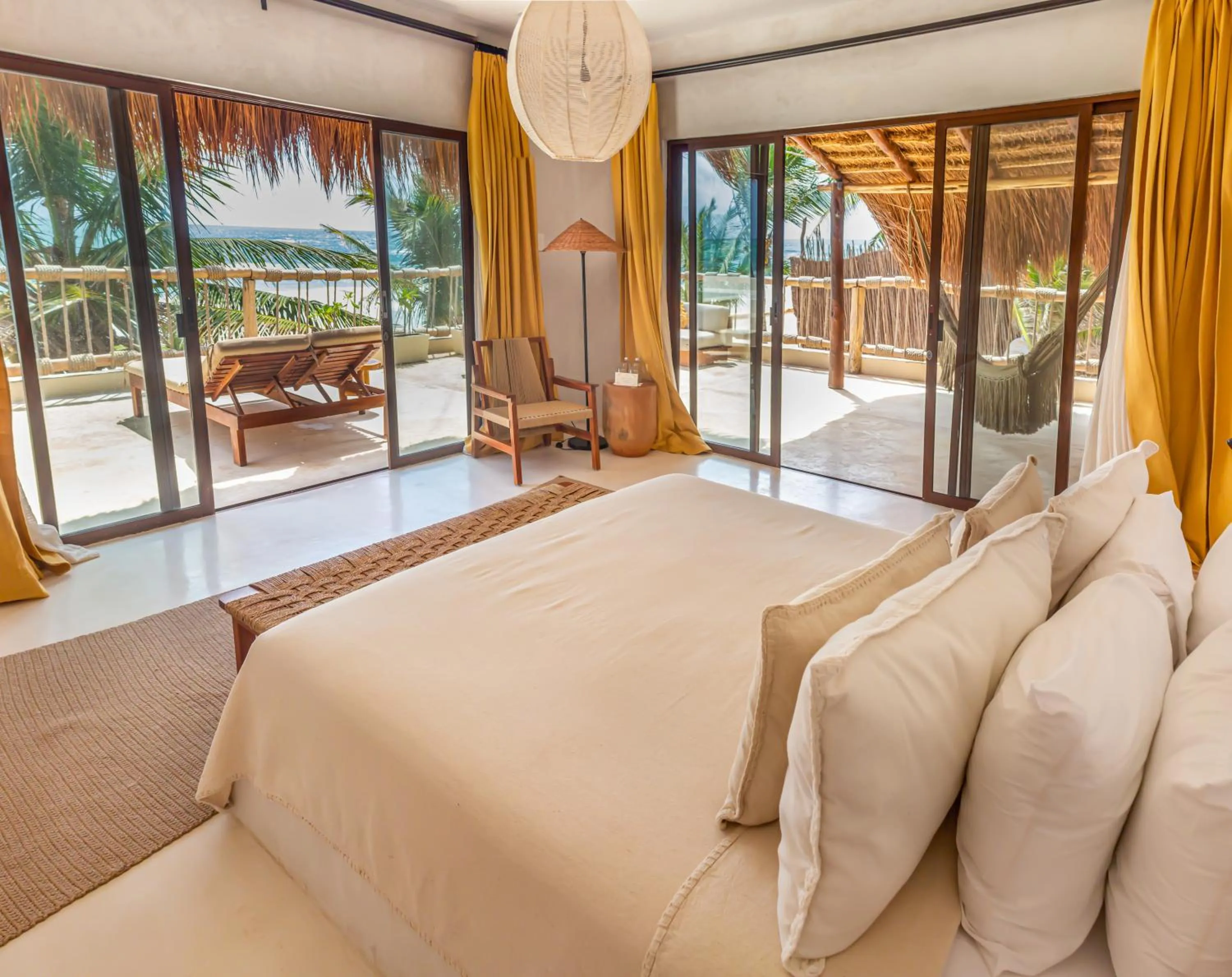 Bed in Dune Boutique Hotel located at the party zone