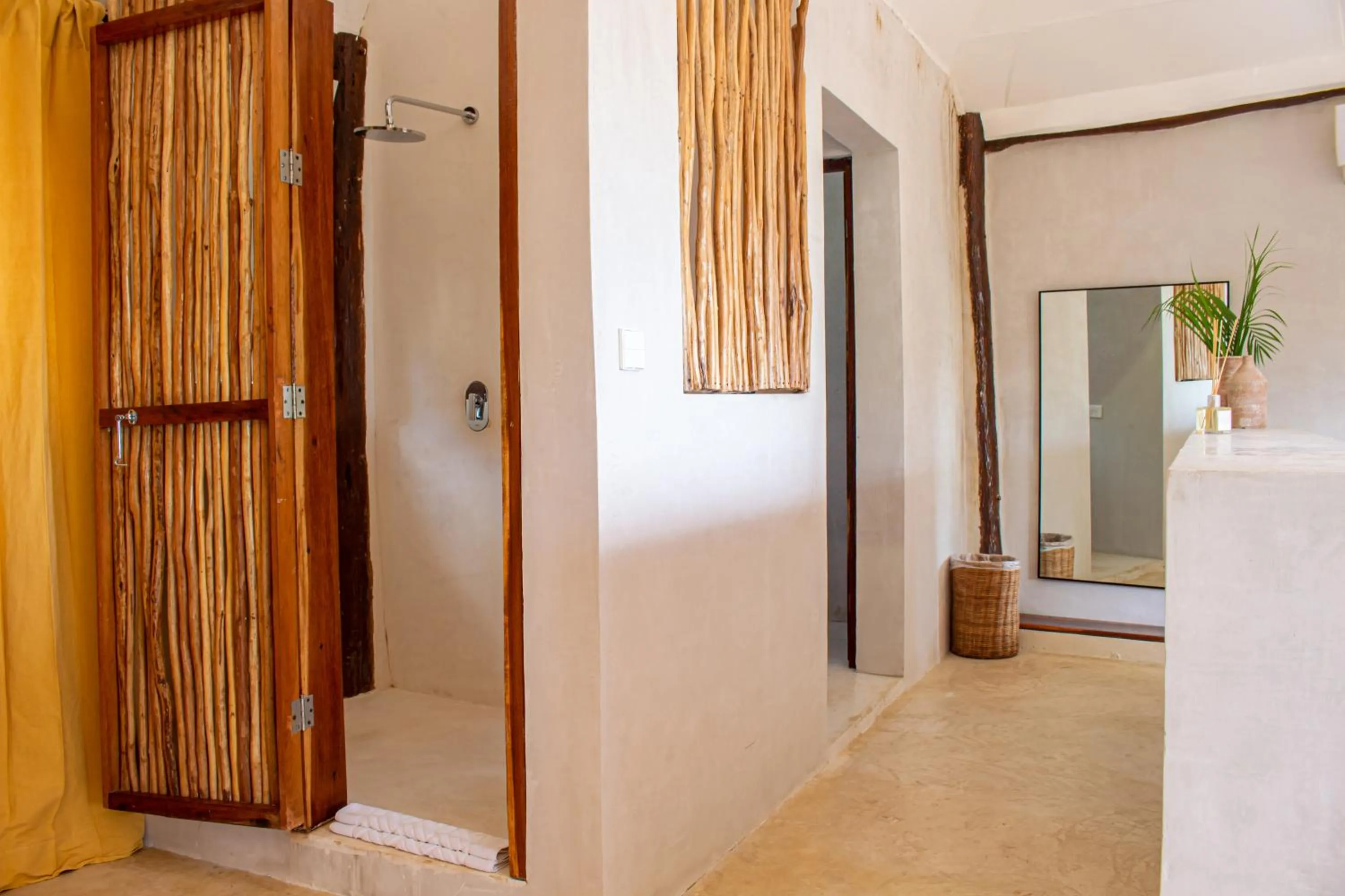 Shower in Dune Boutique Hotel located at the party zone