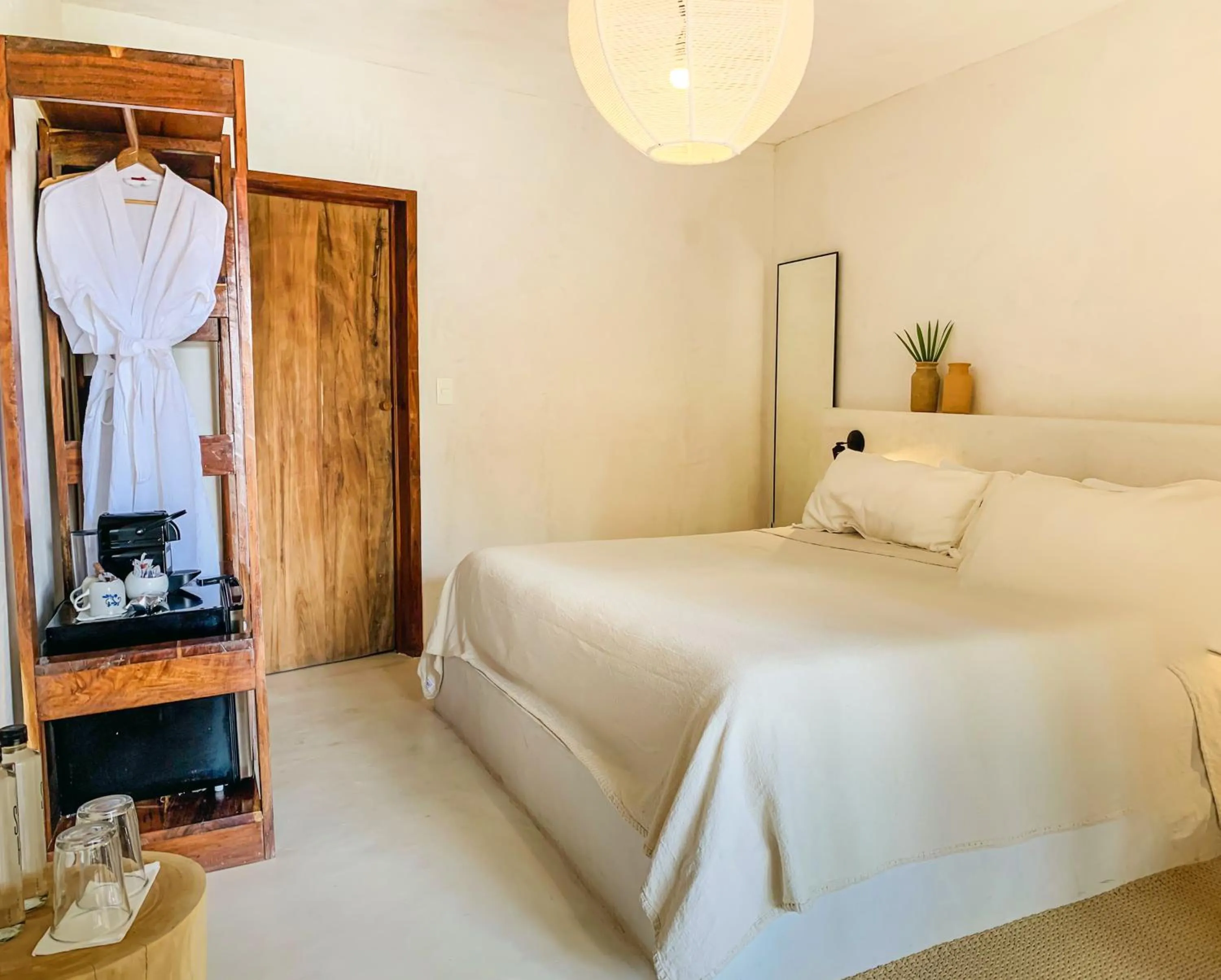 Bed in Dune Boutique Hotel located at the party zone