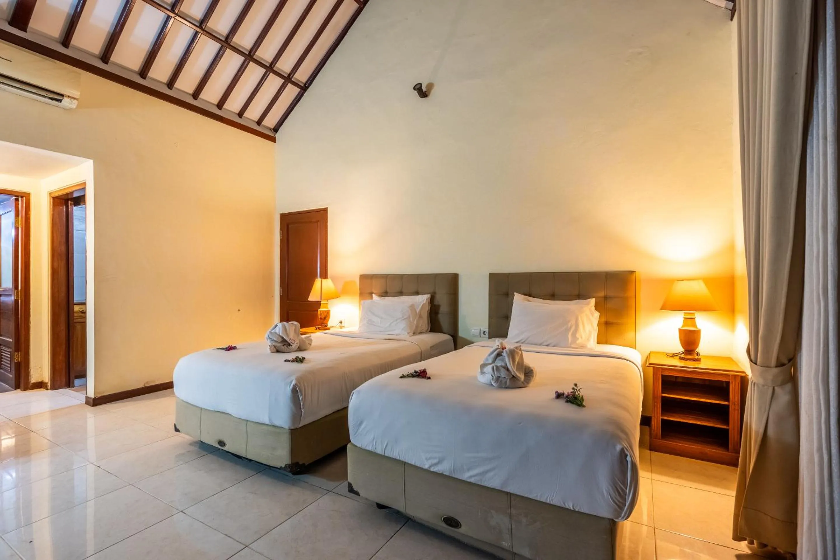 Bed in Taman Surgawi Resort & Spa