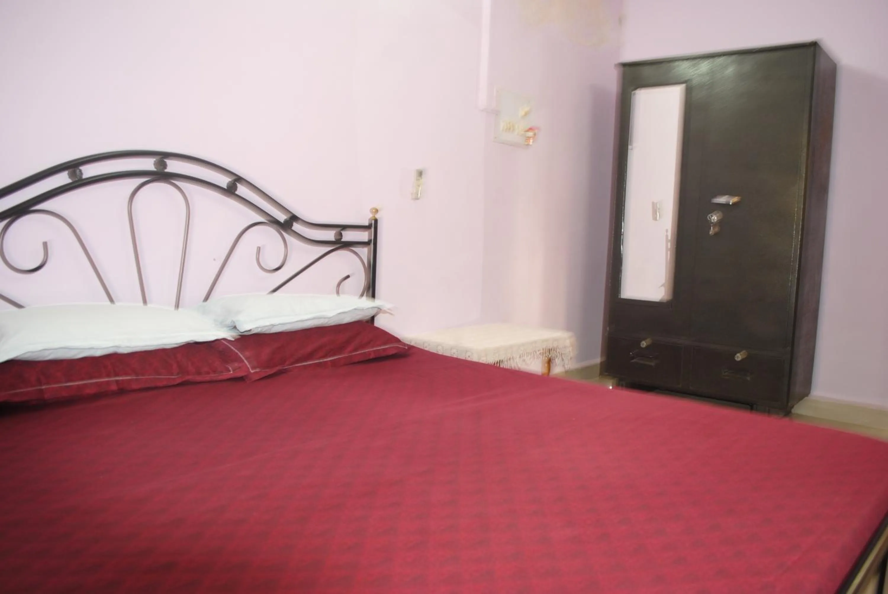 Bed in Joe And Marietta's Guesthouse