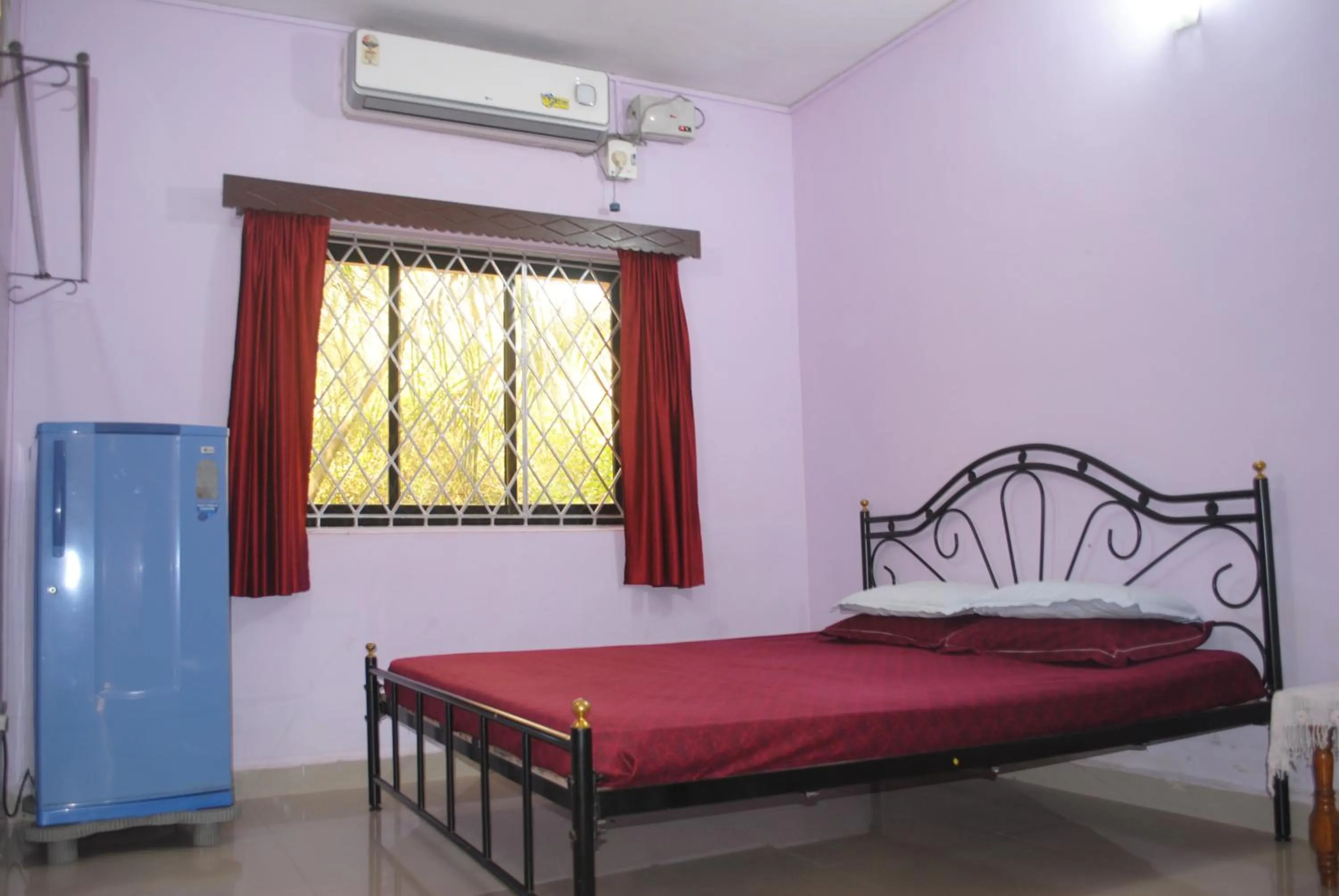 Bed in Joe And Marietta's Guesthouse