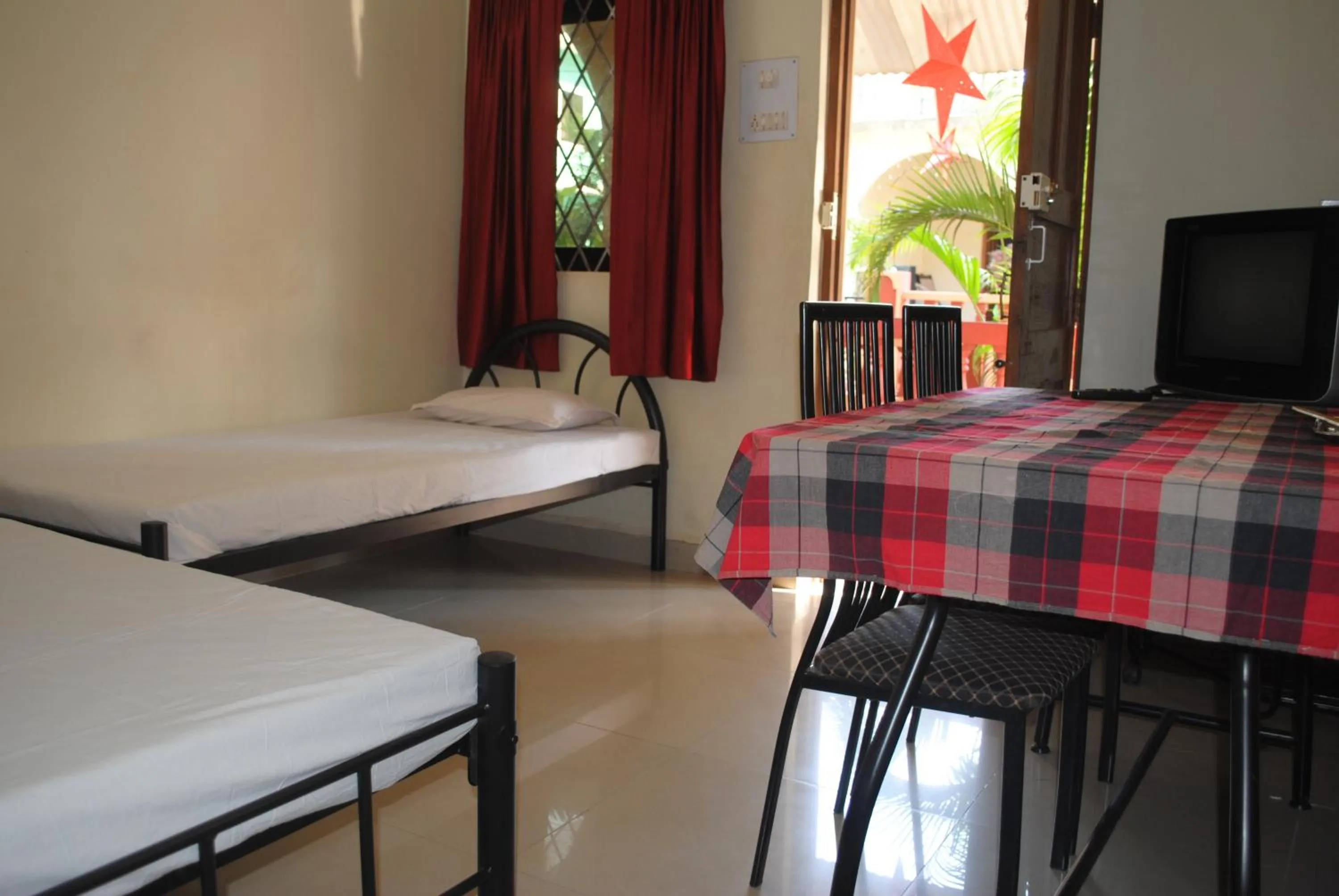 Bed in Joe And Marietta's Guesthouse