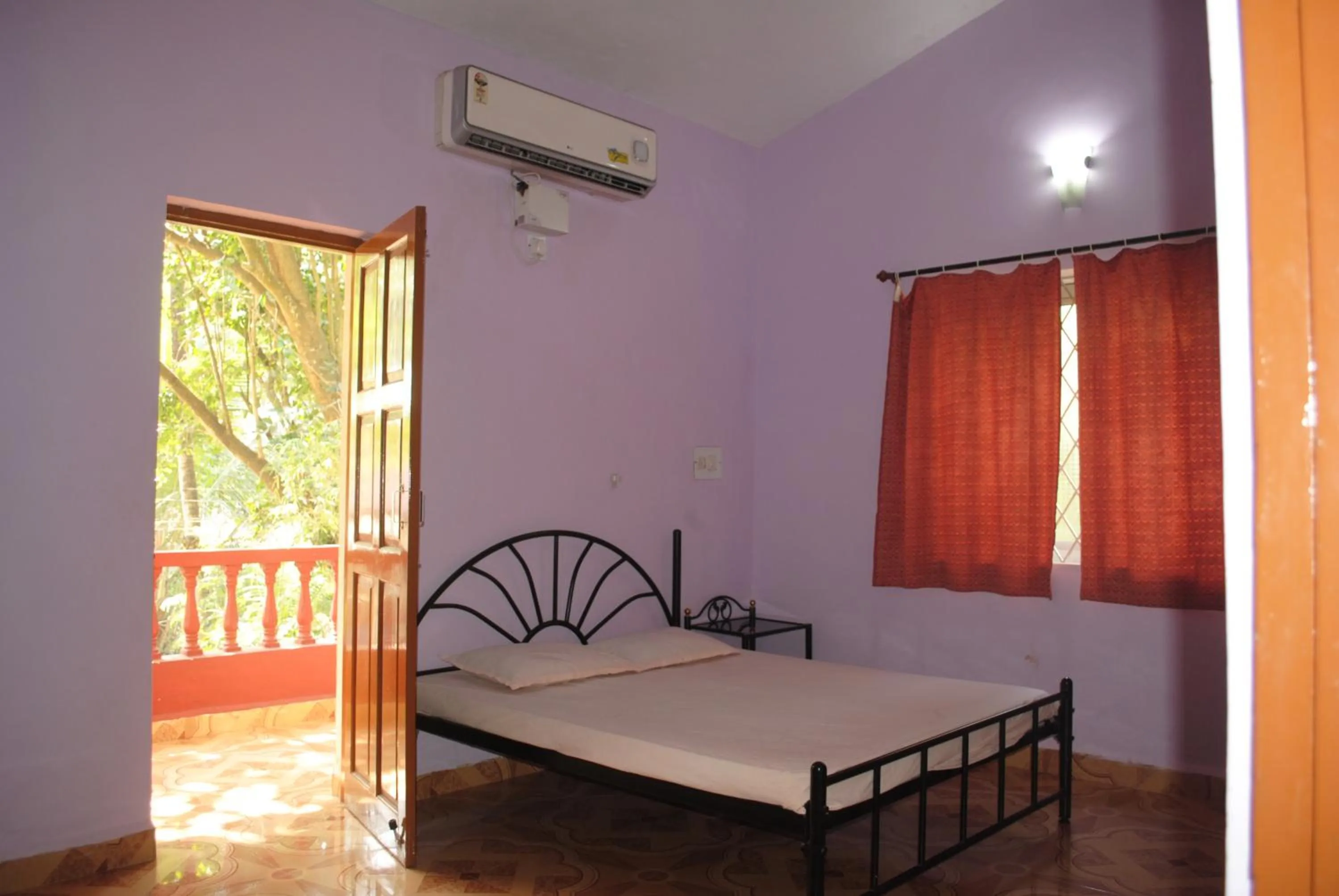 Photo of the whole room, Bed in Joe And Marietta's Guesthouse