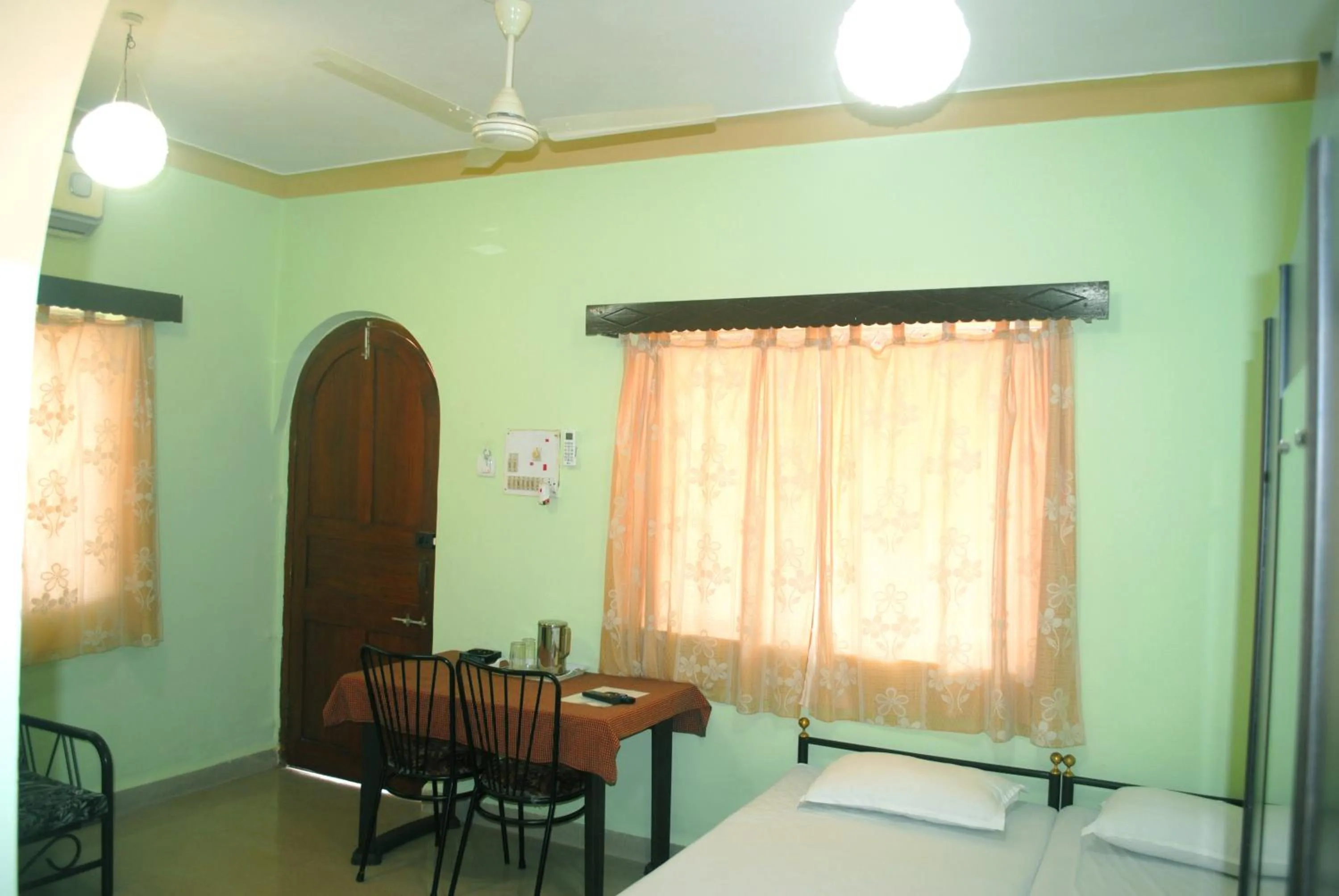 Bed in Joe And Marietta's Guesthouse