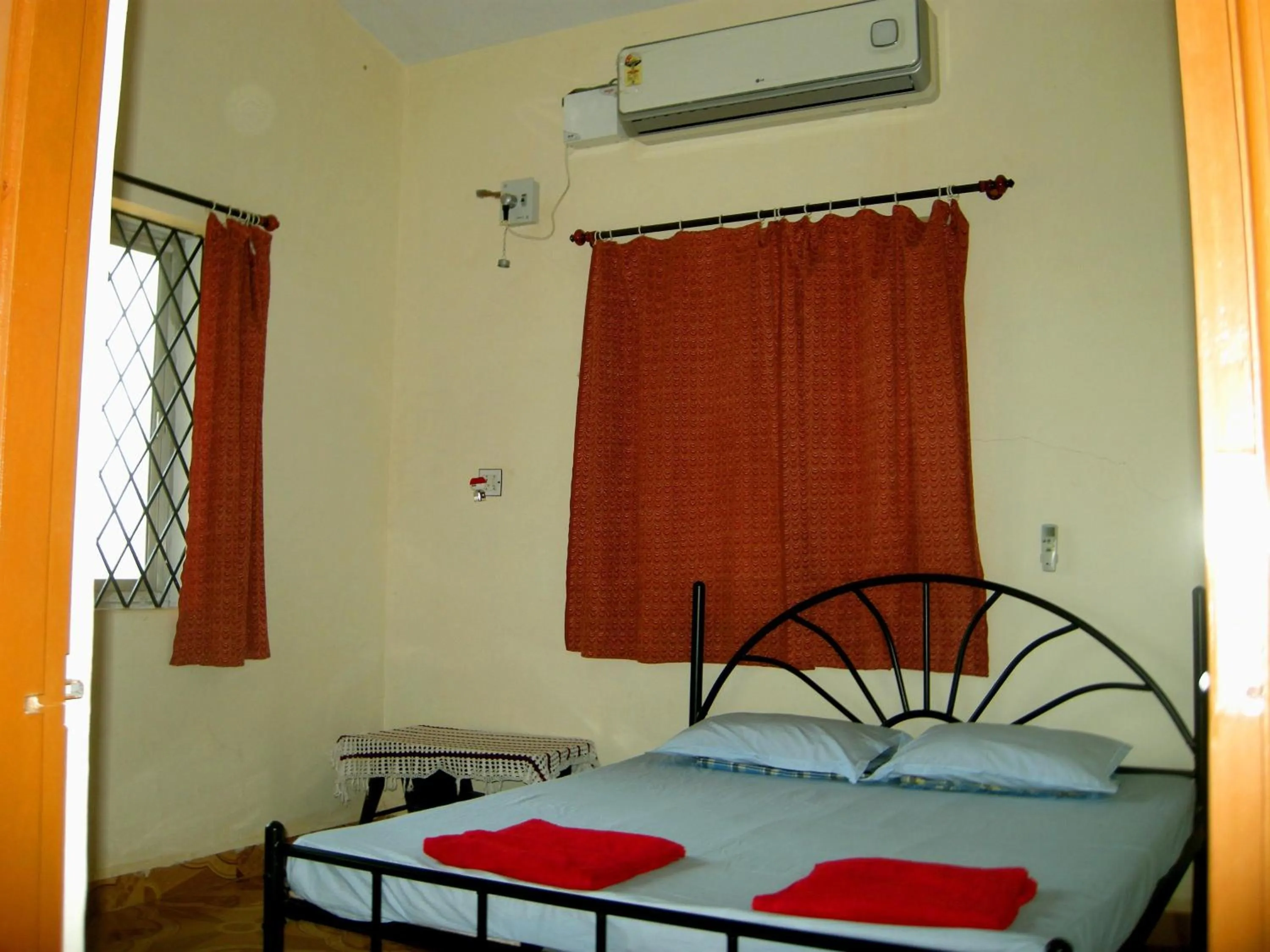 Bed in Joe And Marietta's Guesthouse