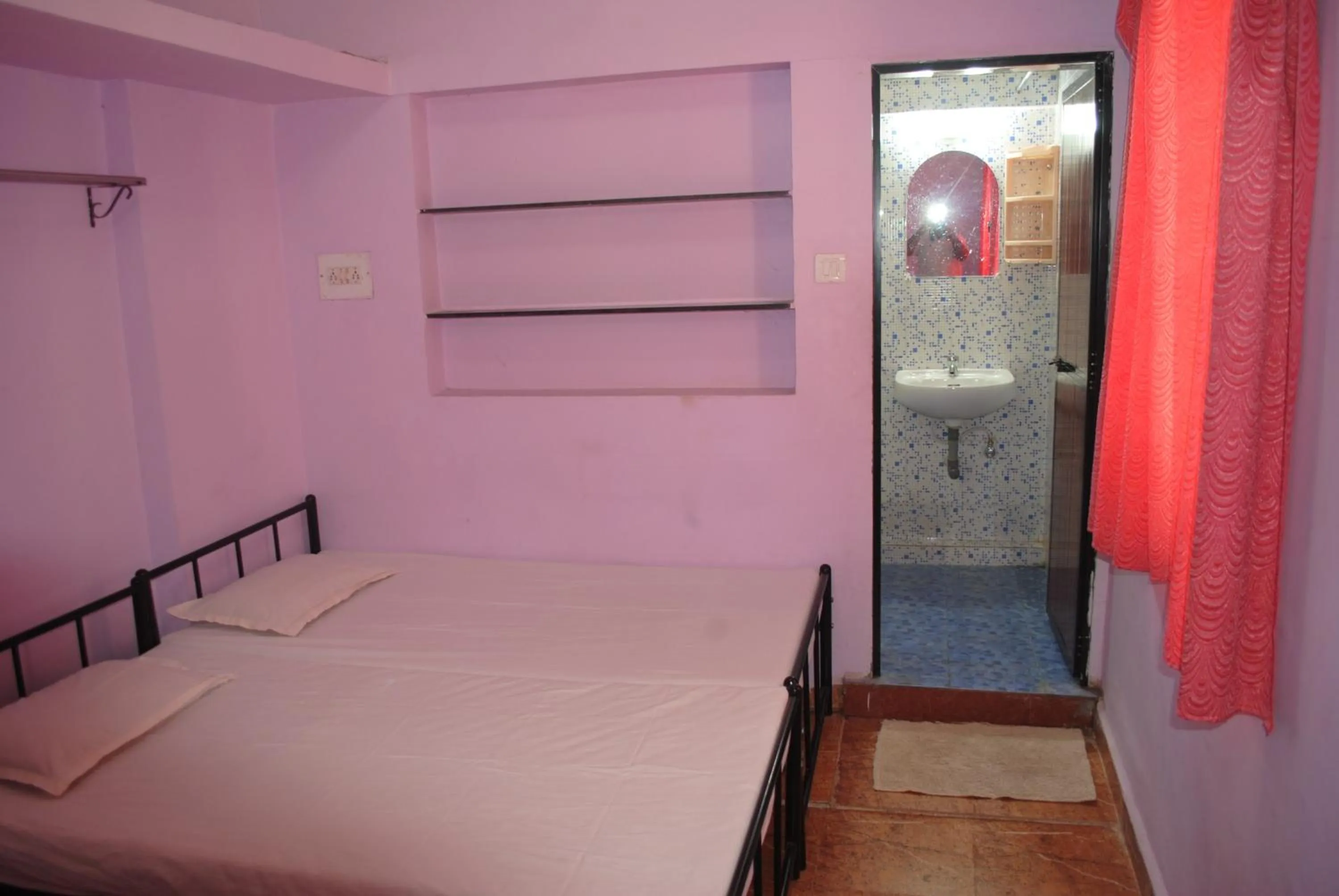 Bed in Joe And Marietta's Guesthouse