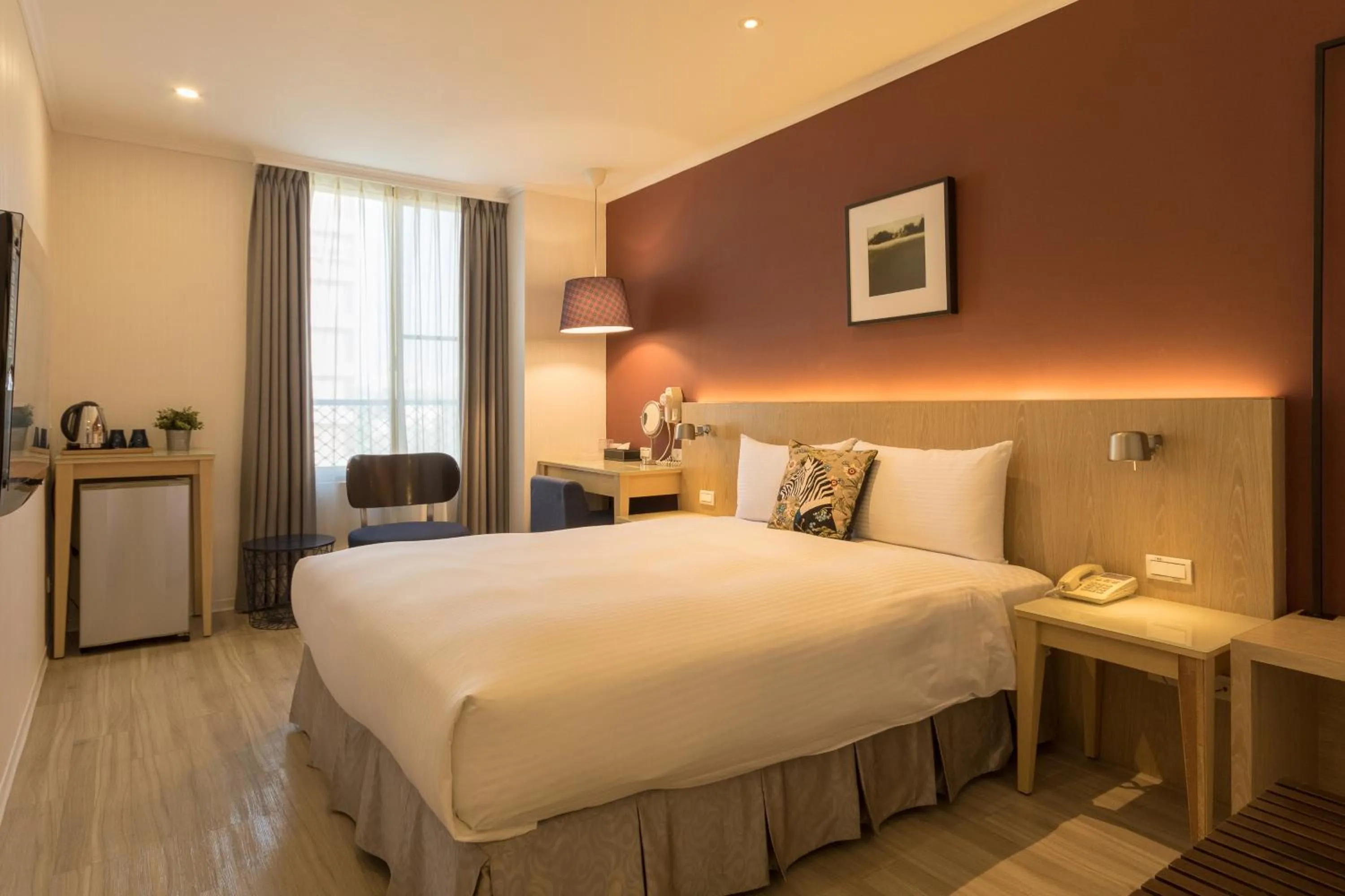 Bed in Just Enjoy Business Hotel