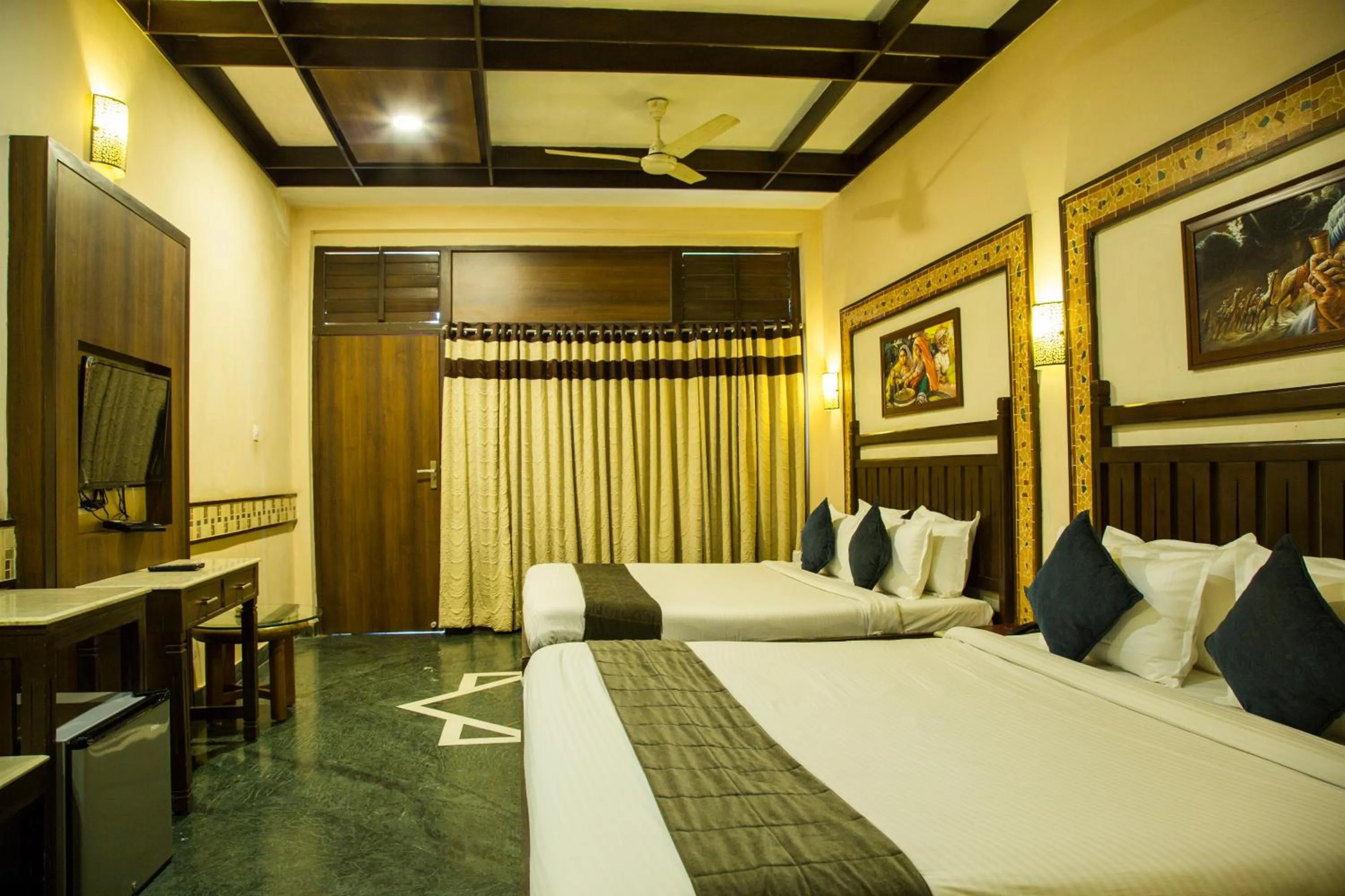 Bed in Hotel Mount Regency