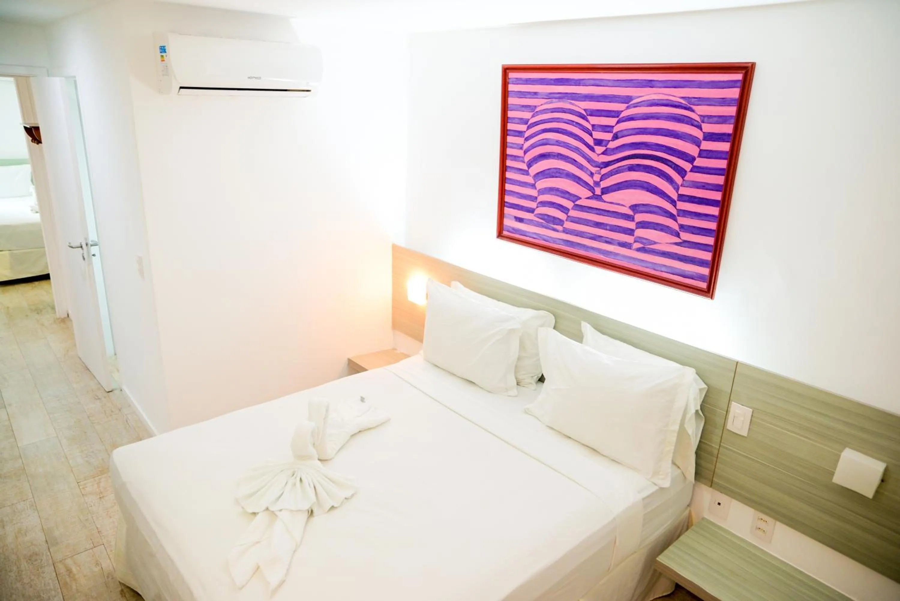 Bed in Waterfront Apart Hotel