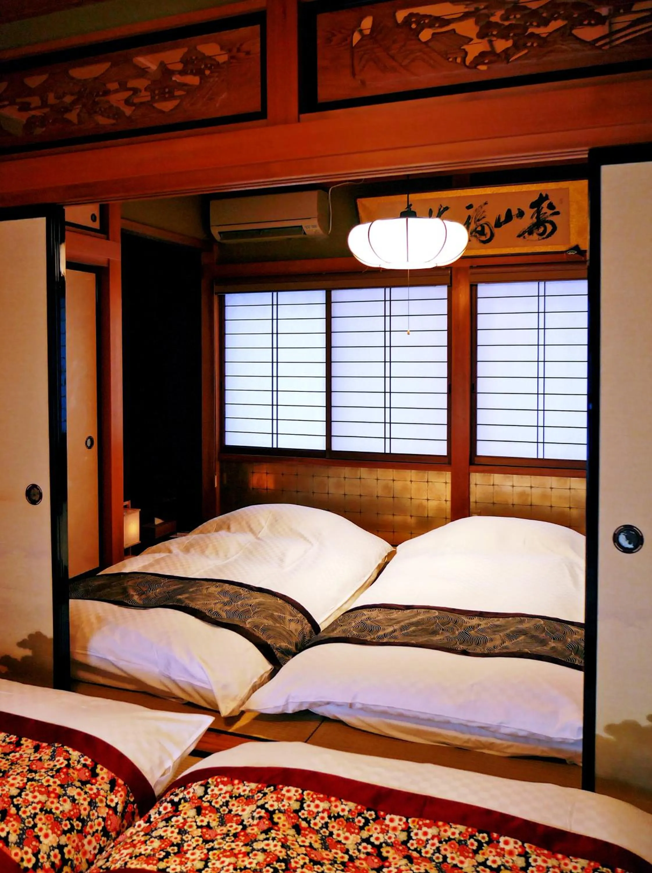 Bed in K's Villa Hida-an
