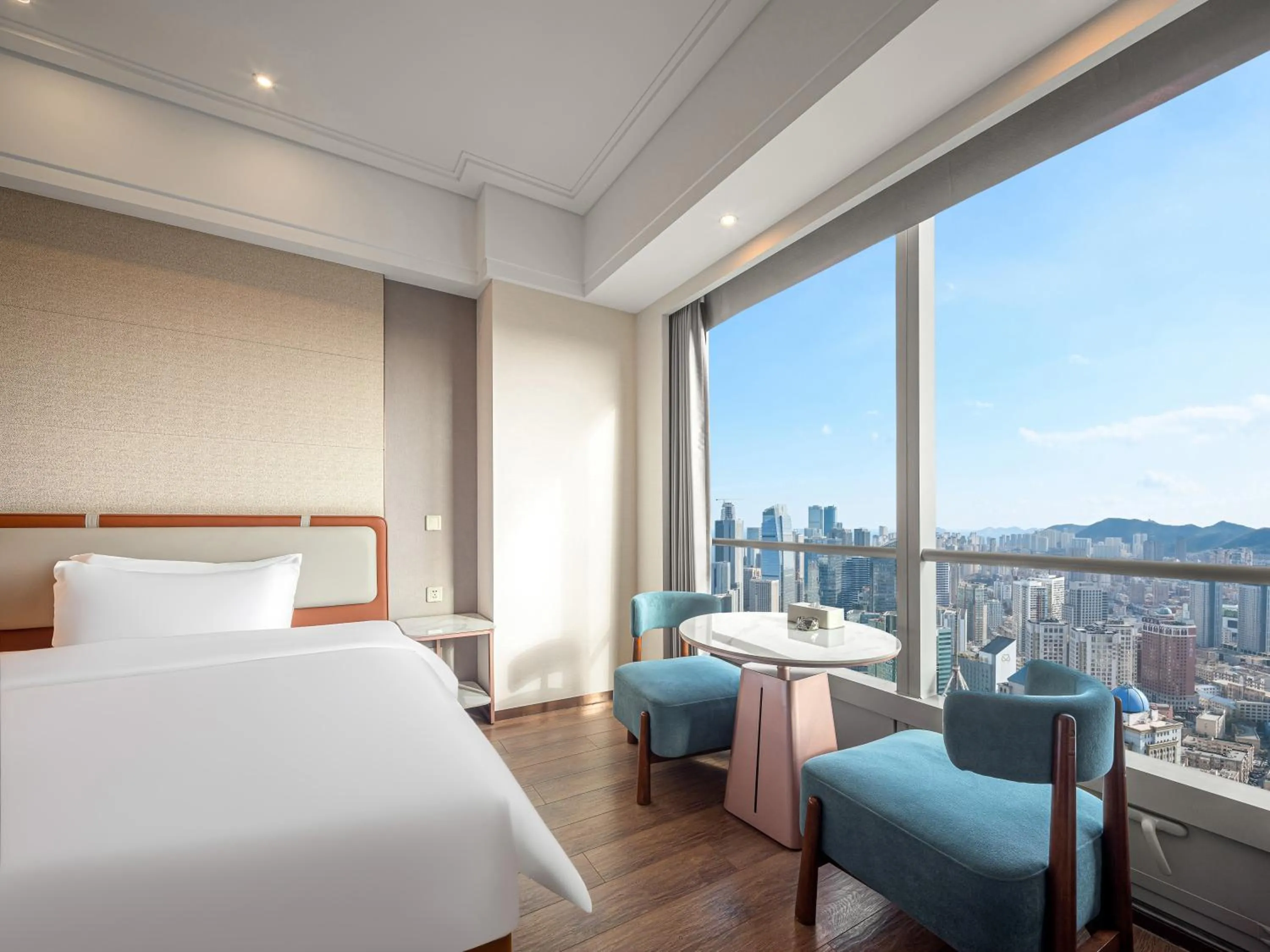 Bed in Dalian Zhongshan Square Seaview Meilun Hotel