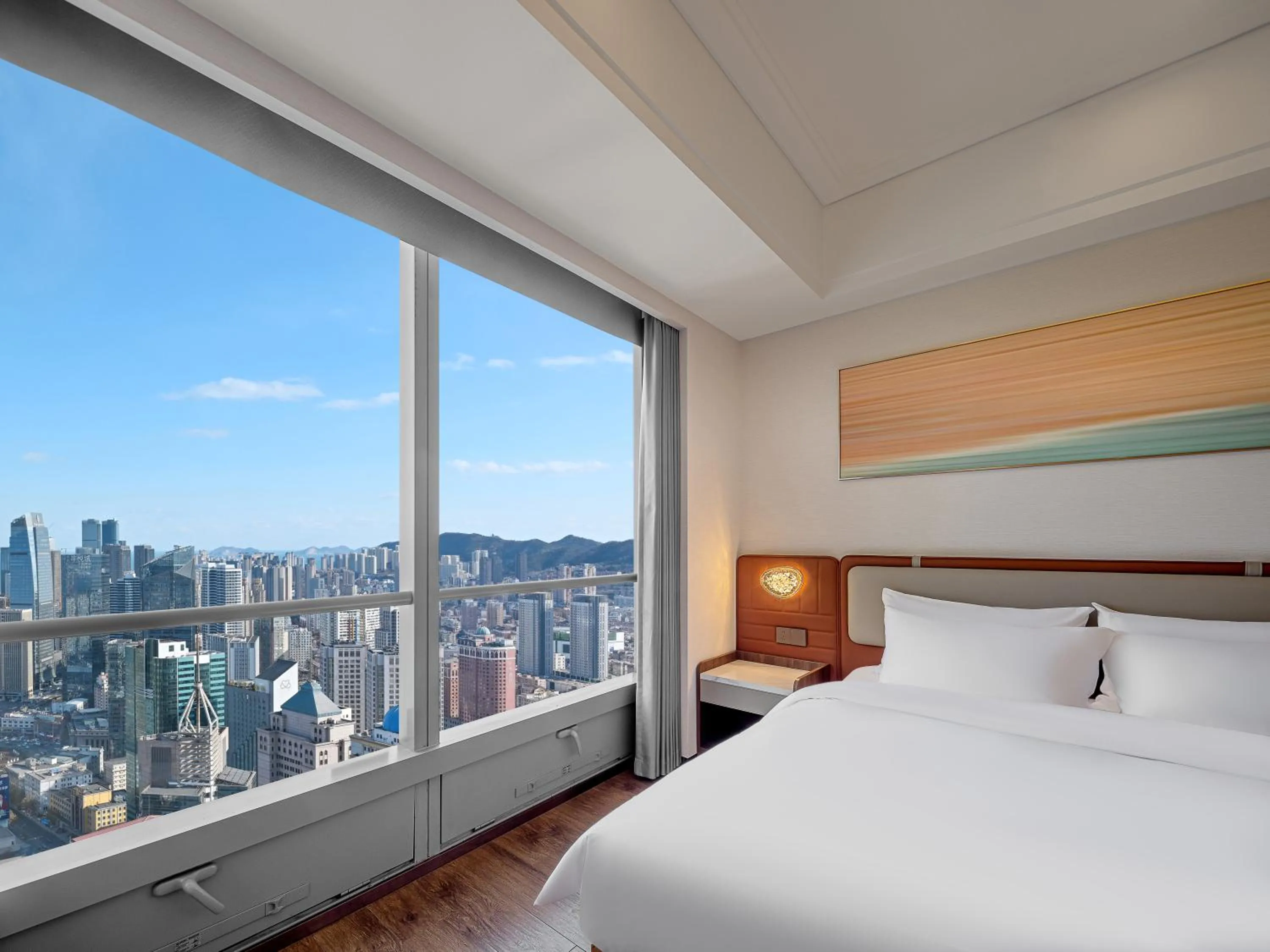 Bed in Dalian Zhongshan Square Seaview Meilun Hotel