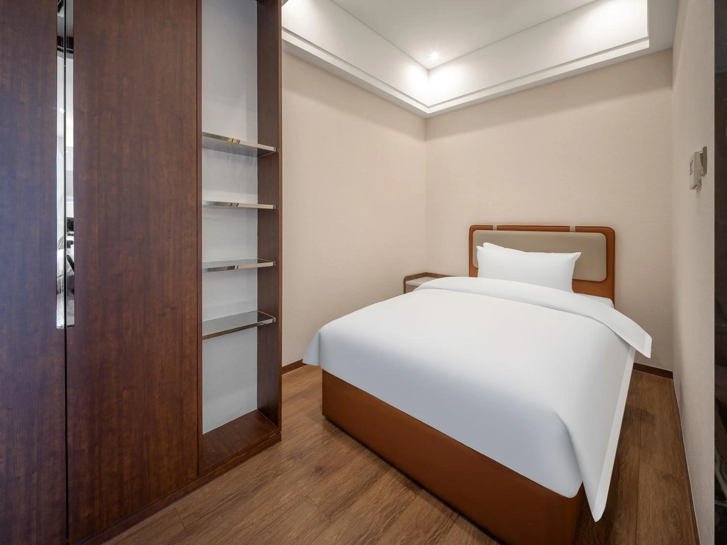 Bed in Dalian Zhongshan Square Seaview Meilun Hotel